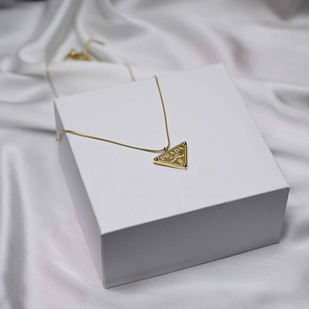 Prada symbol necklace in gold