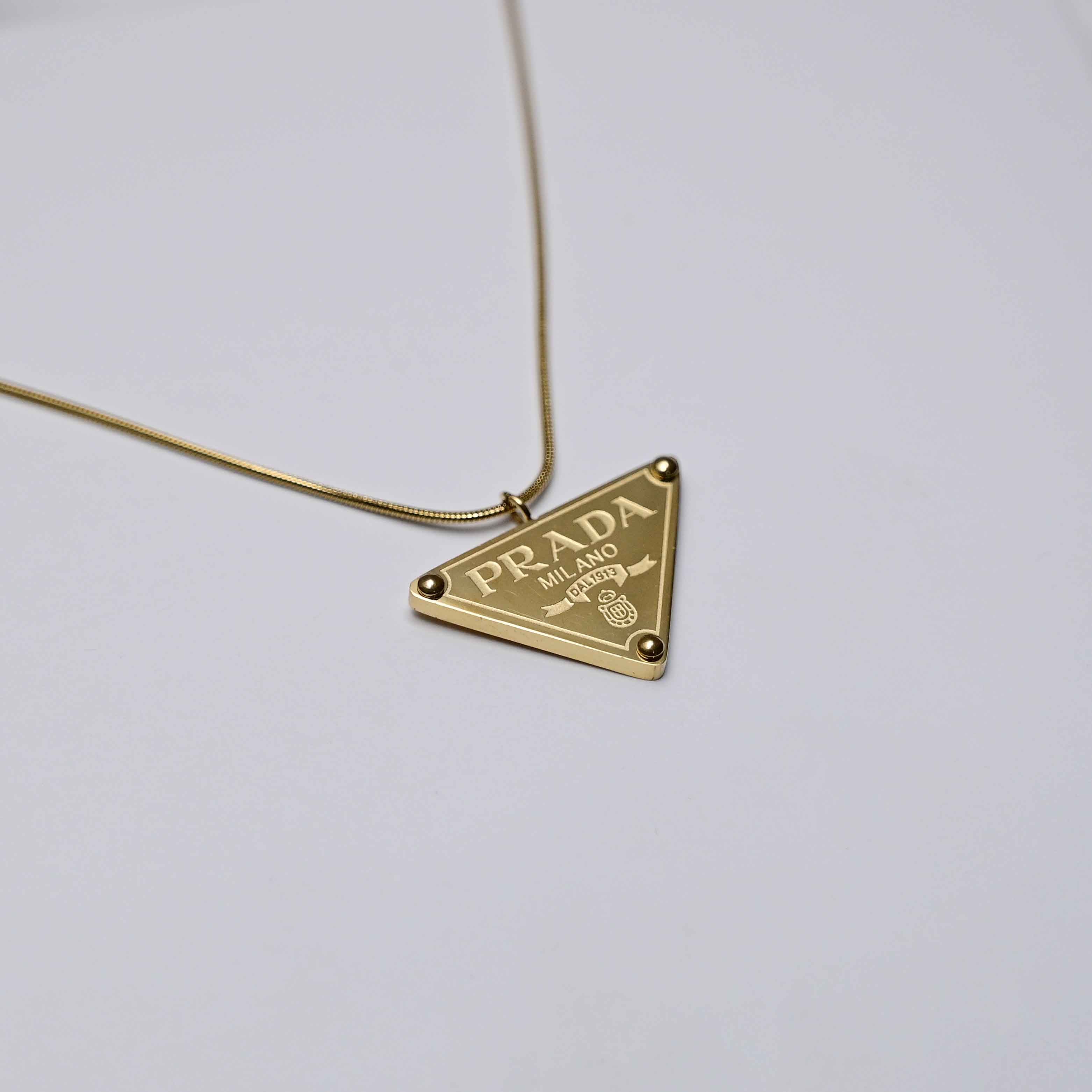 Prada symbol necklace in gold