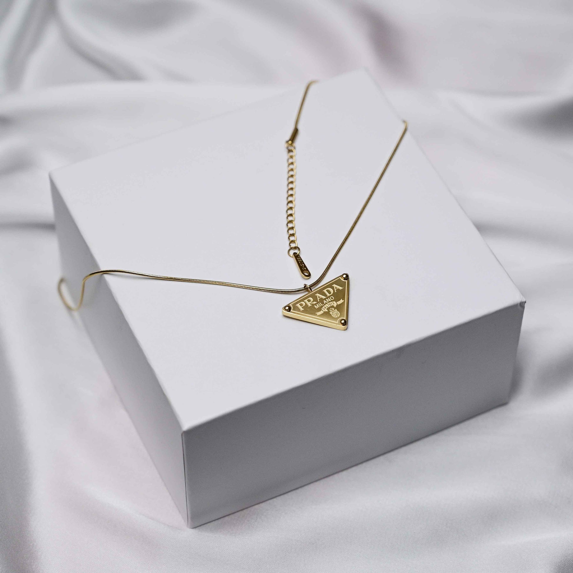 Prada symbol necklace in gold
