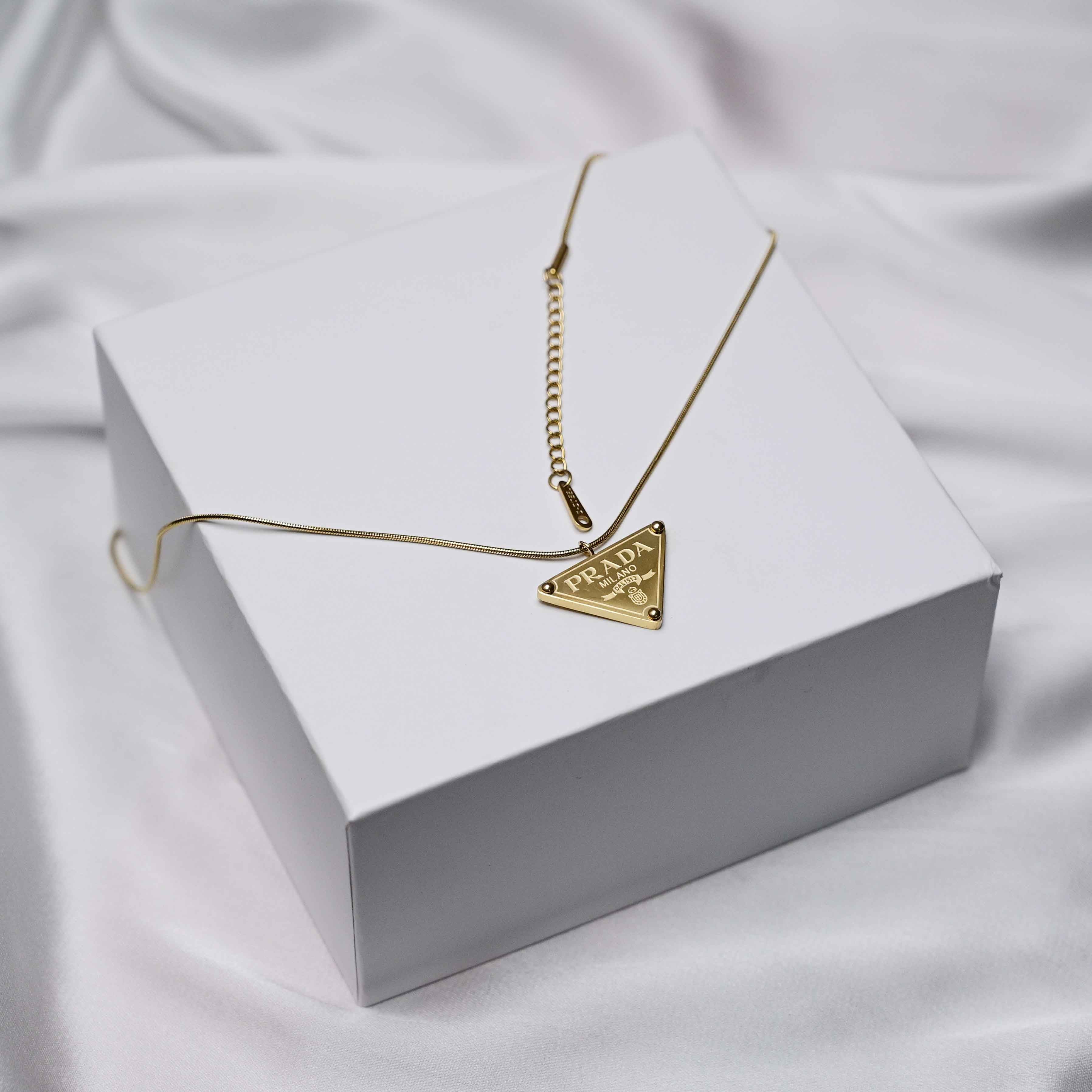 Prada symbol necklace in gold