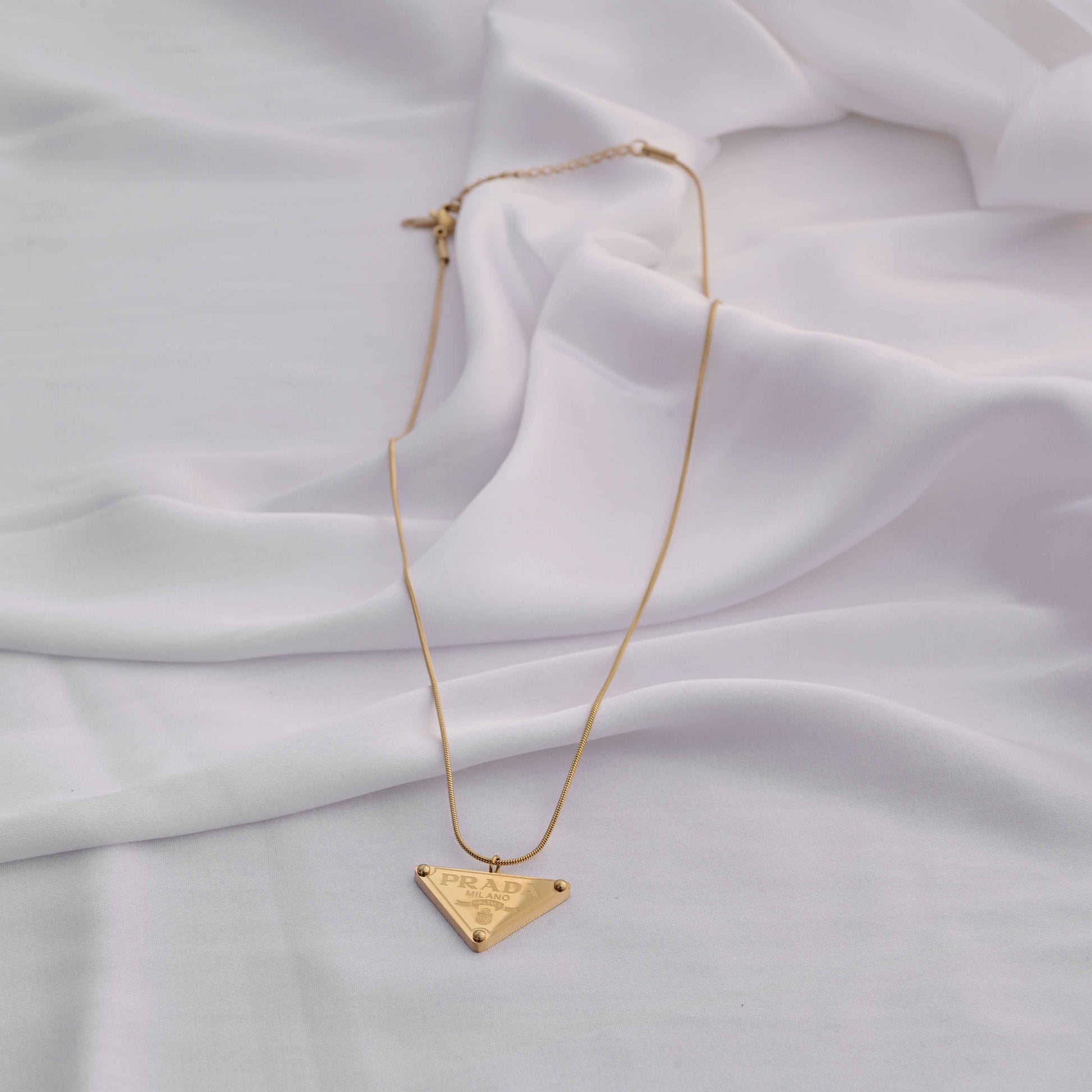 Prada symbol necklace in gold