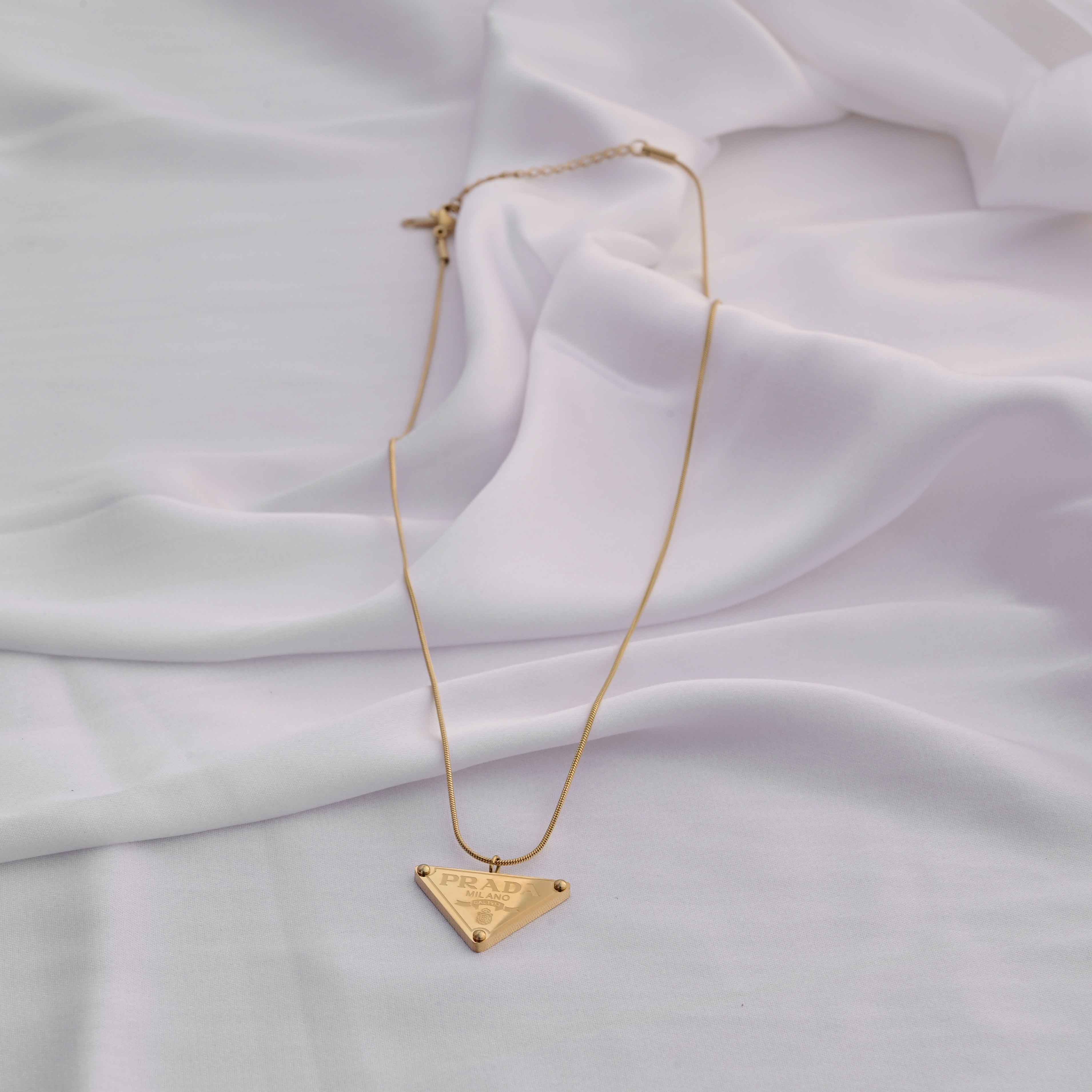 Prada symbol necklace in gold