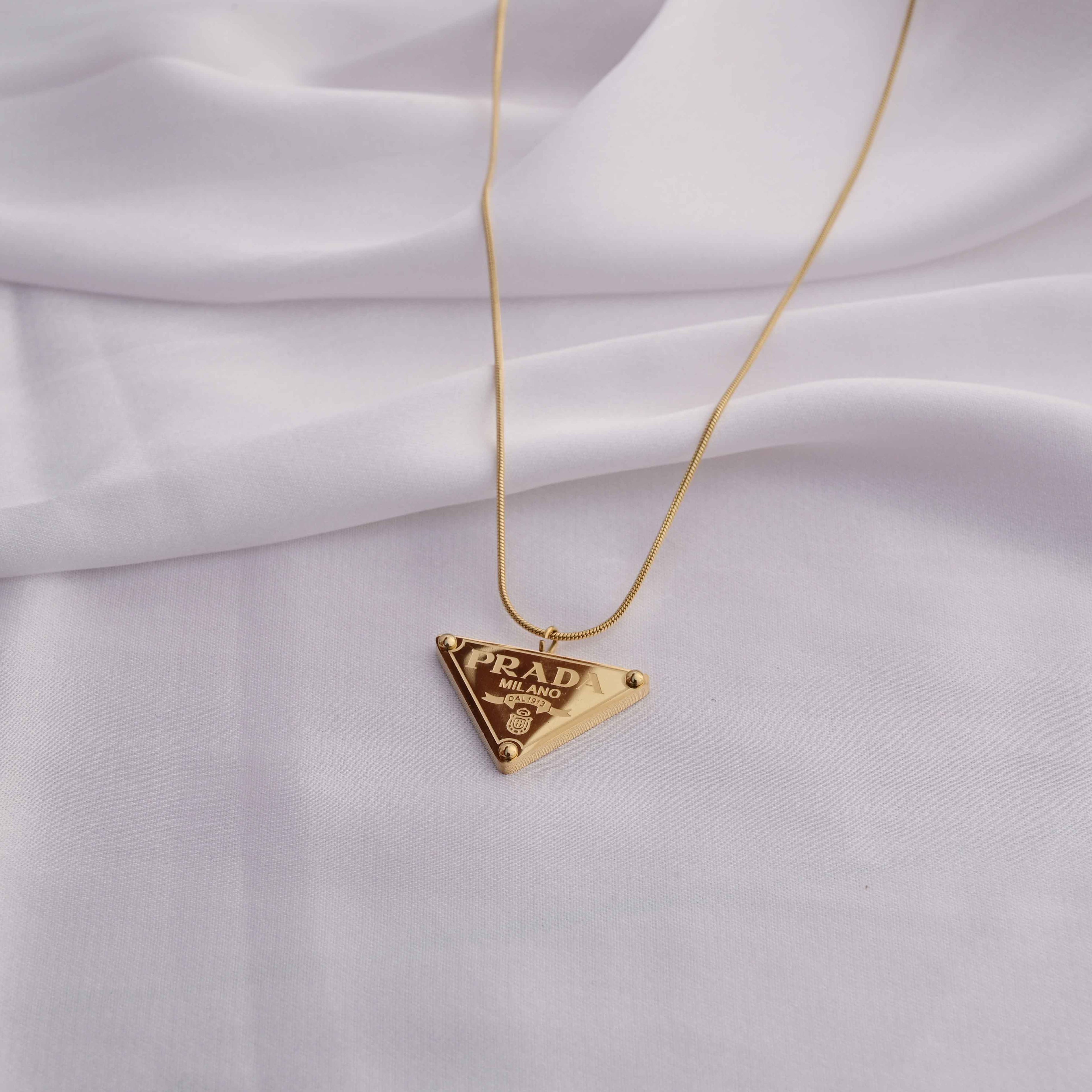 Prada symbol necklace in gold