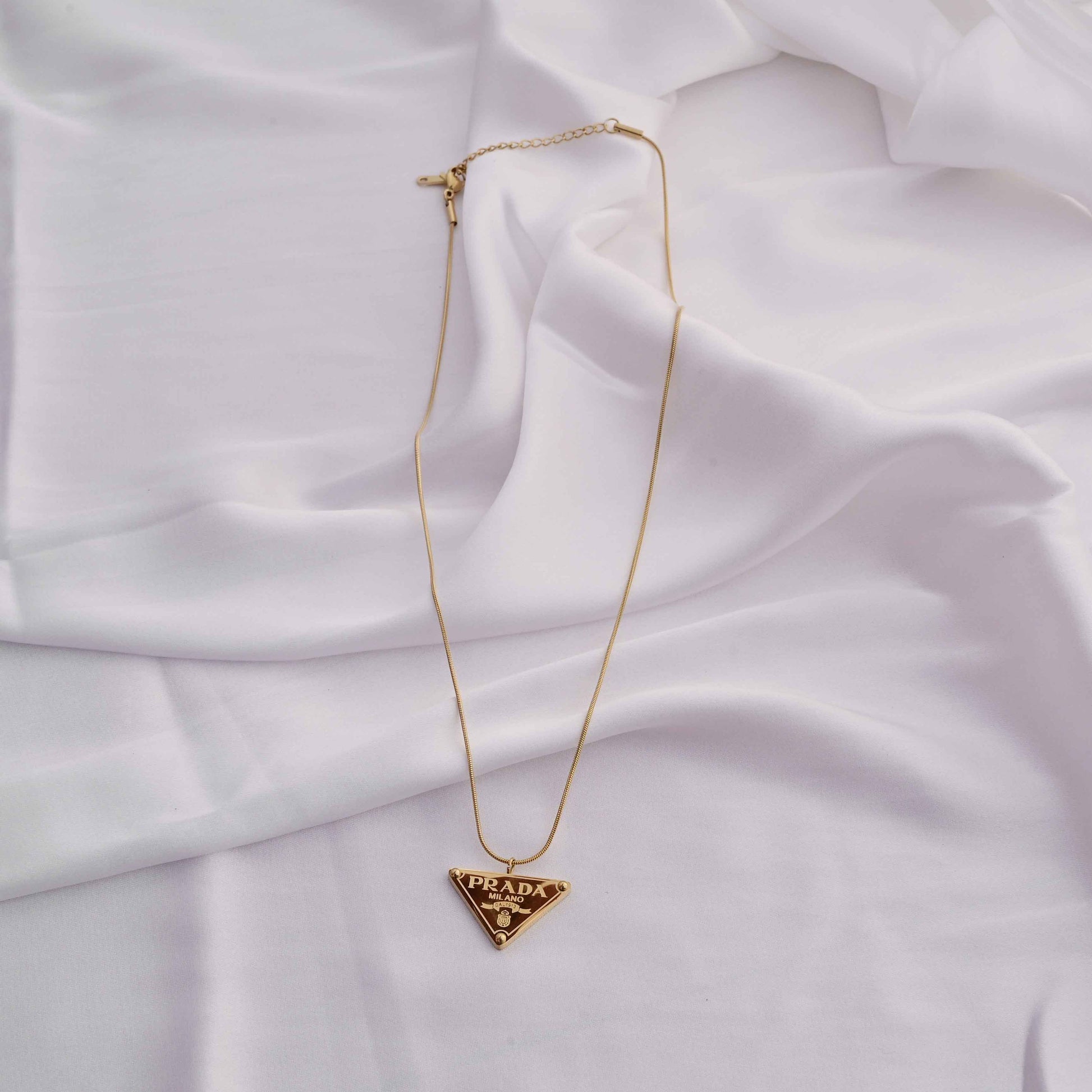Prada symbol necklace in gold