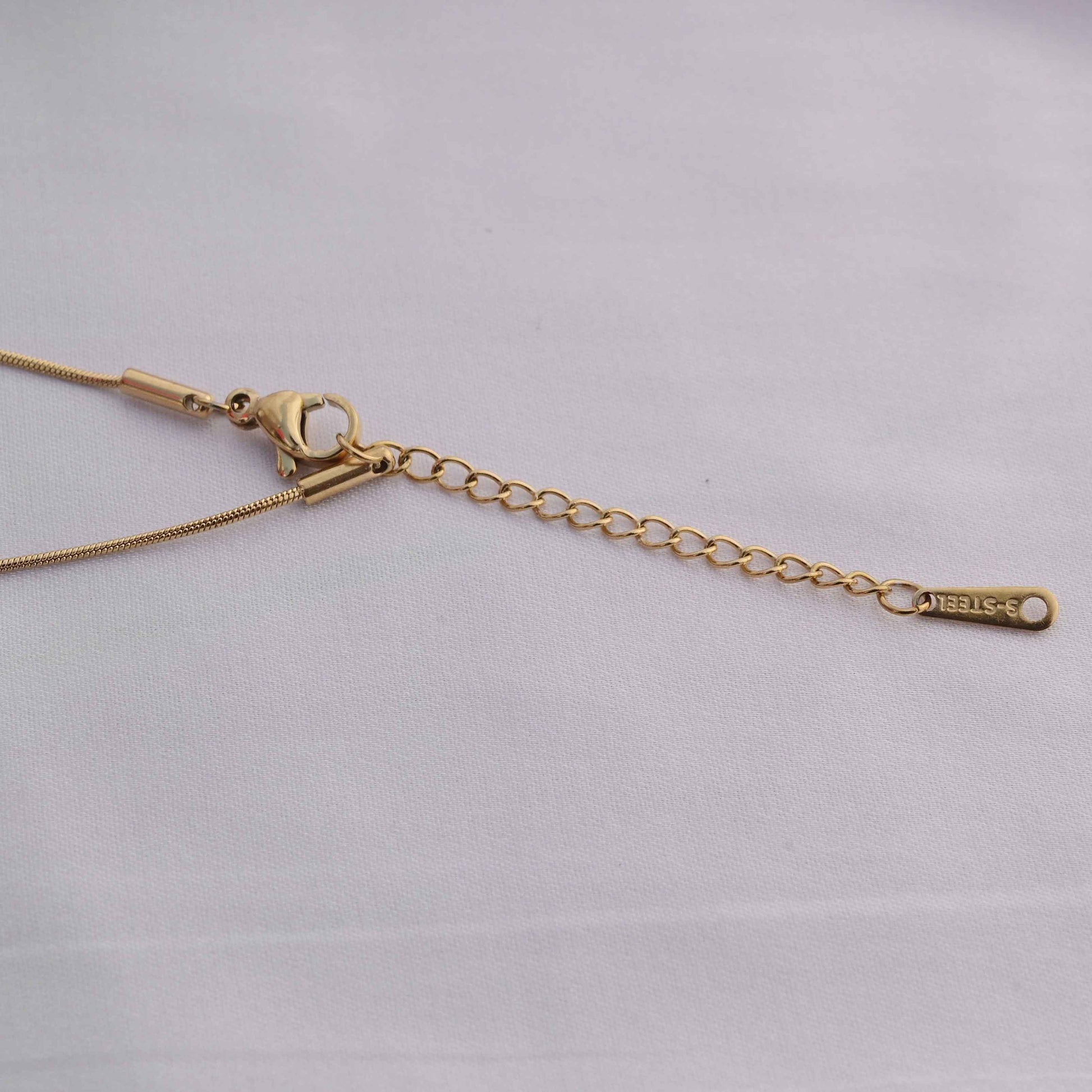 Prada symbol necklace in gold