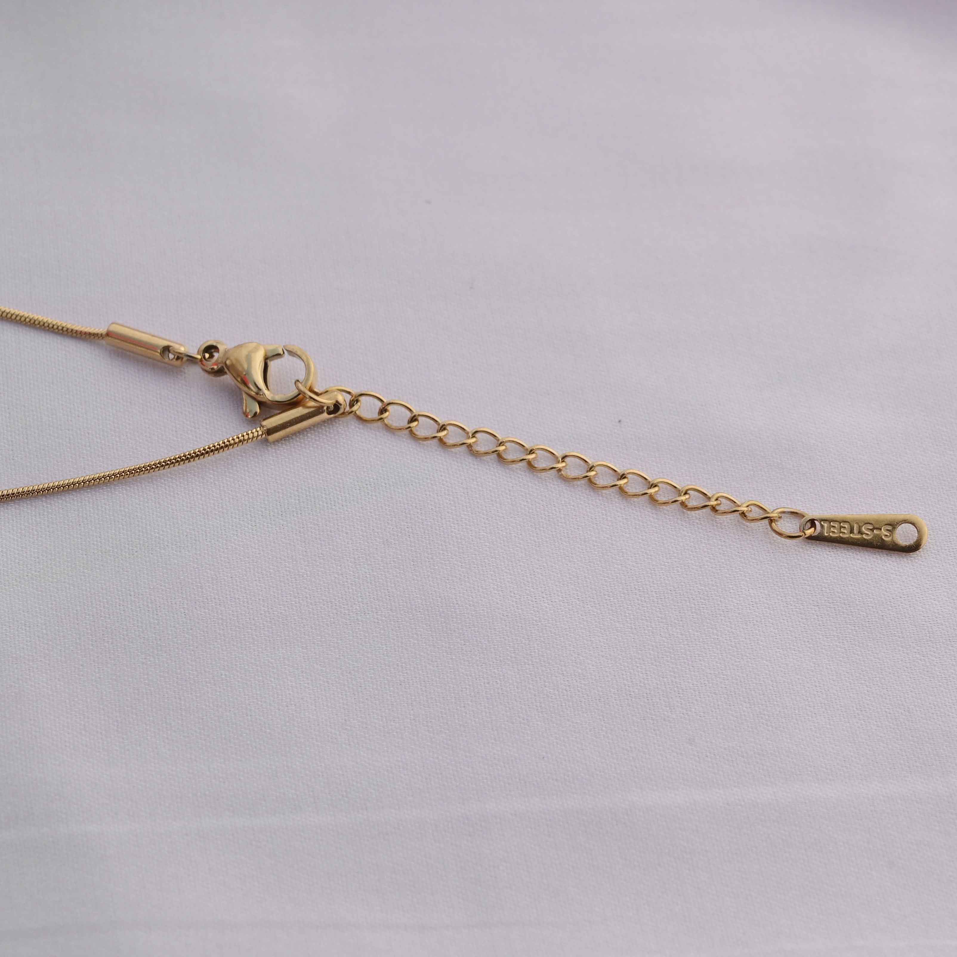 Prada symbol necklace in gold