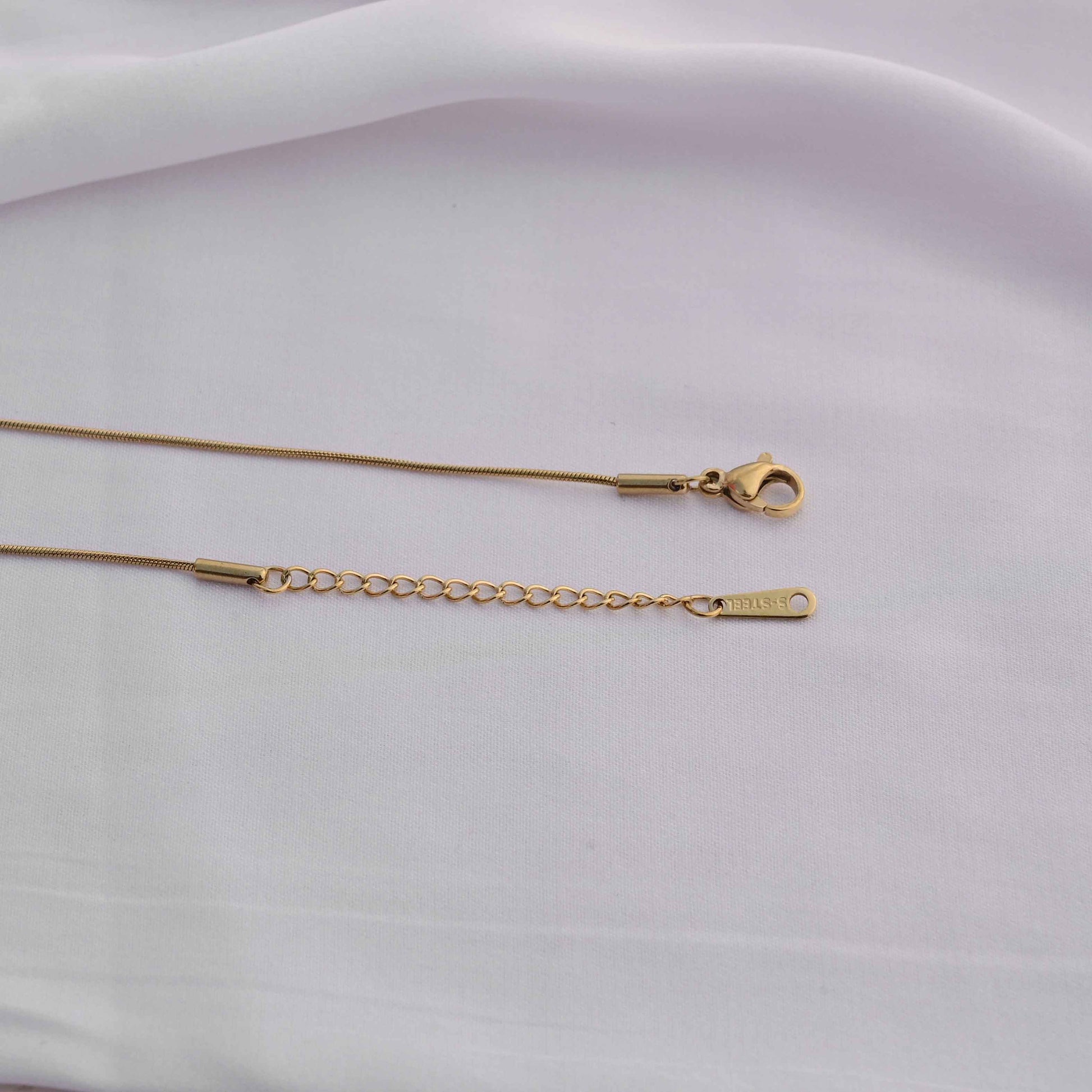 Prada symbol necklace in gold