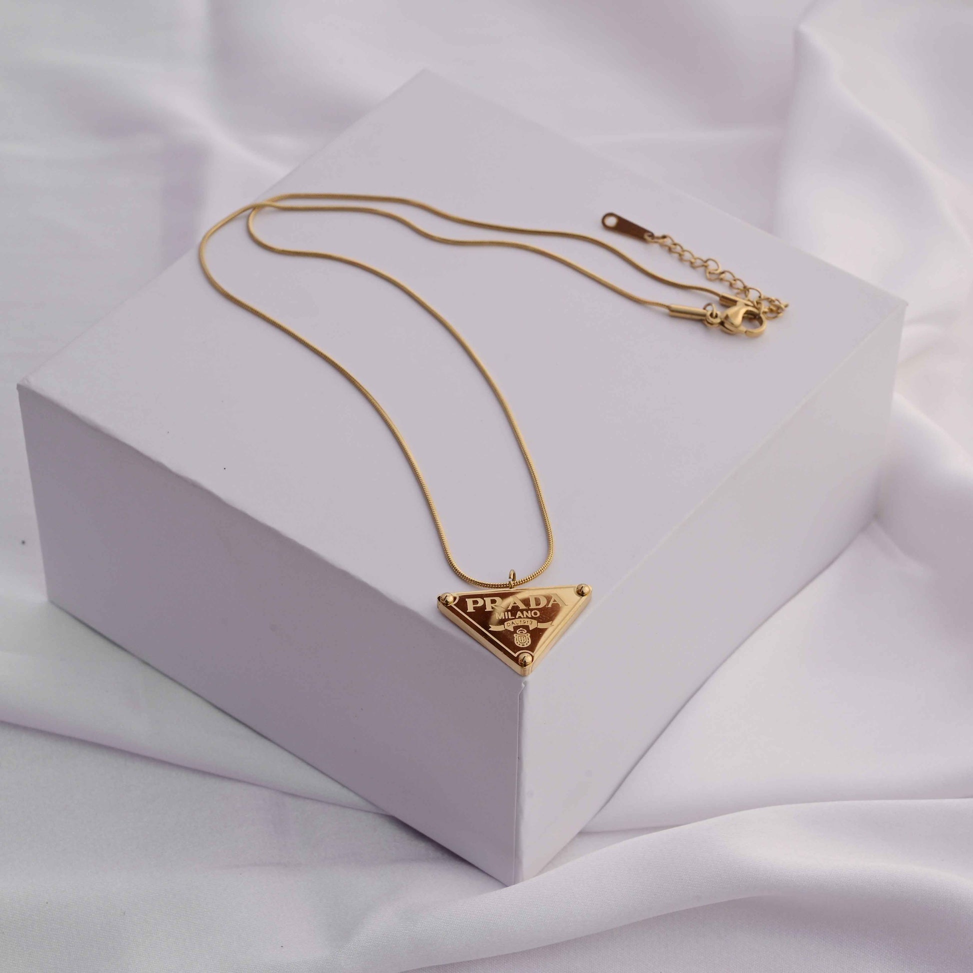 Prada symbol necklace in gold