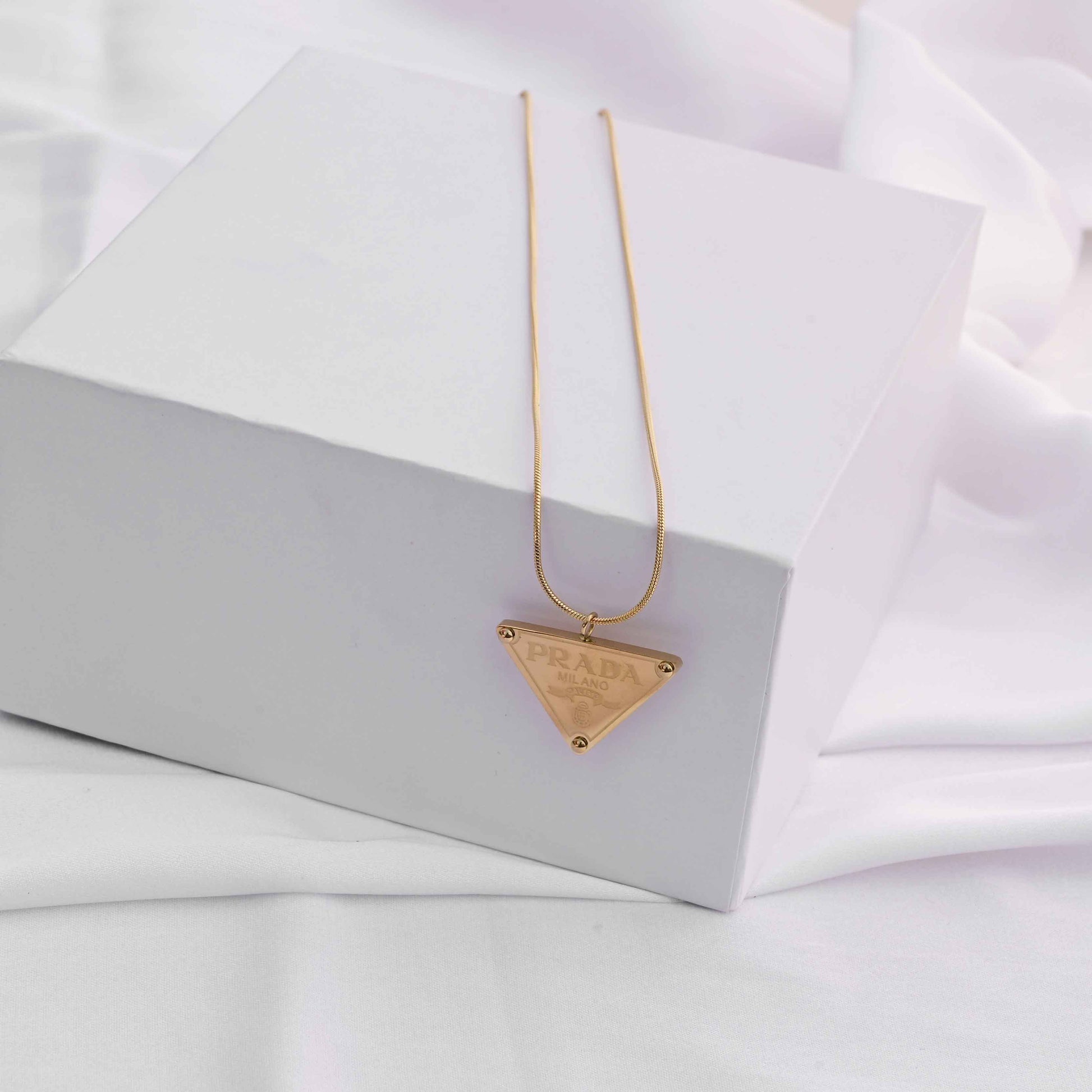 Prada symbol necklace in gold