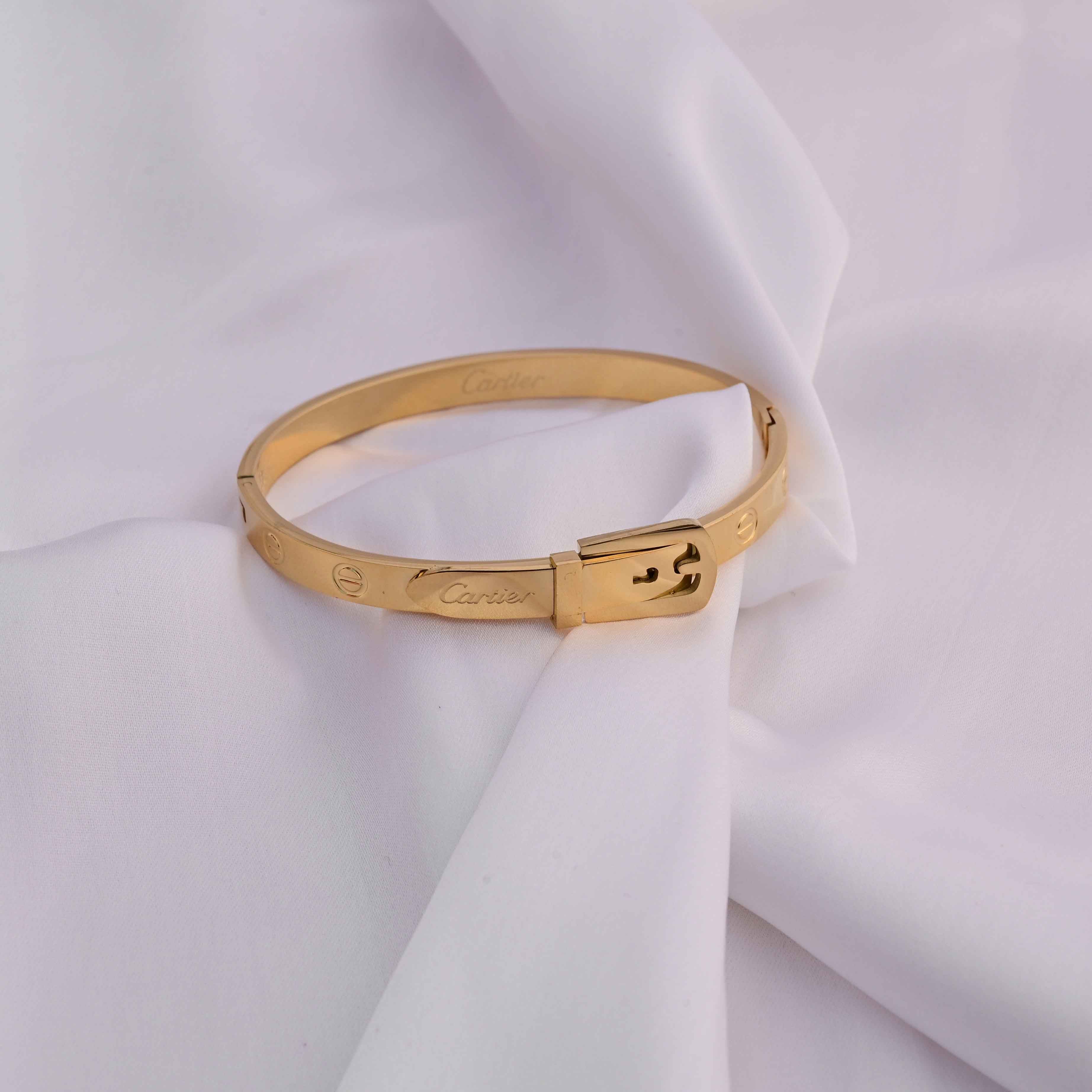Cartier belt bangle bracelet in gold and rose gold