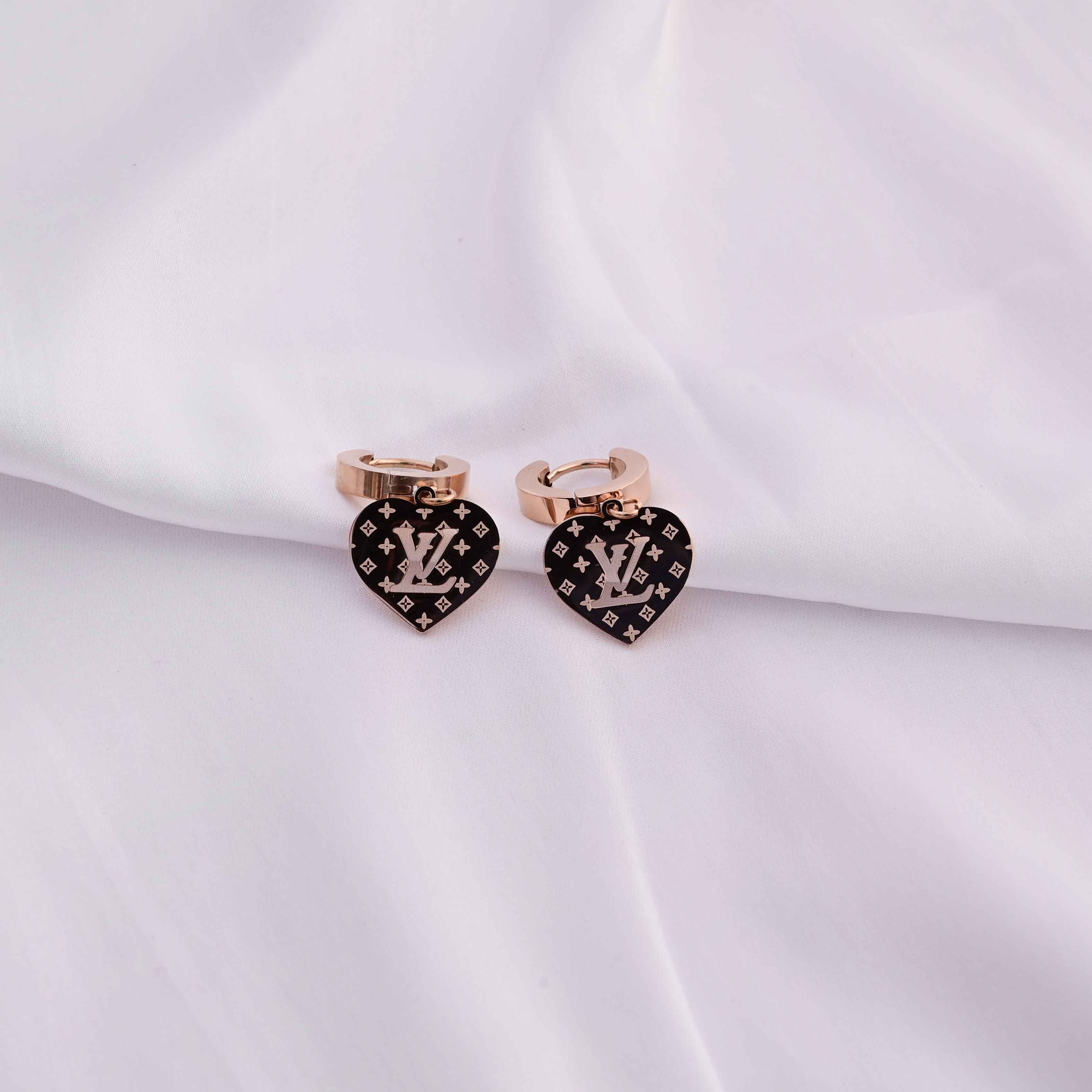 Louis Vuitton heart earrings in Rose gold