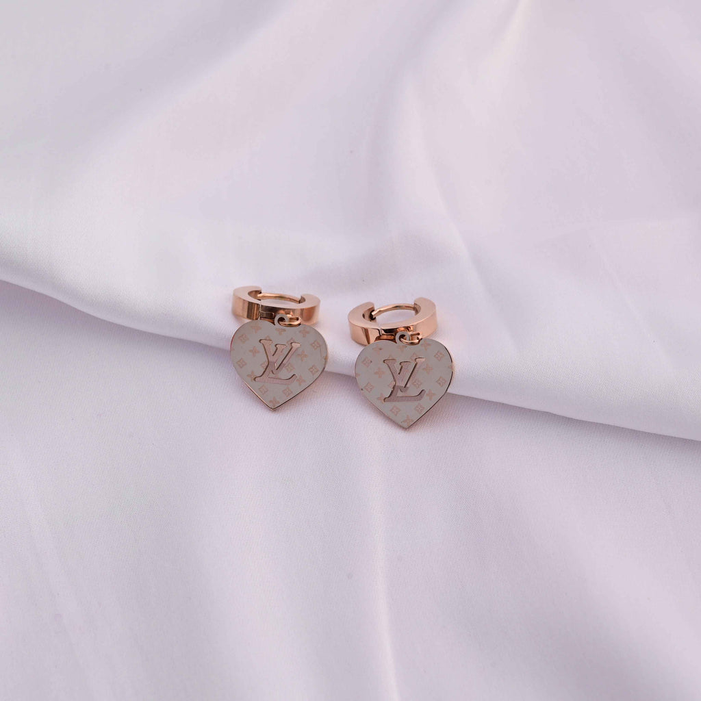 Louis Vuitton heart earrings in Rose gold
