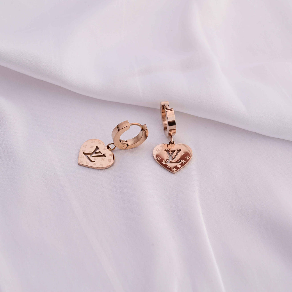 Louis Vuitton heart earrings in Rose gold
