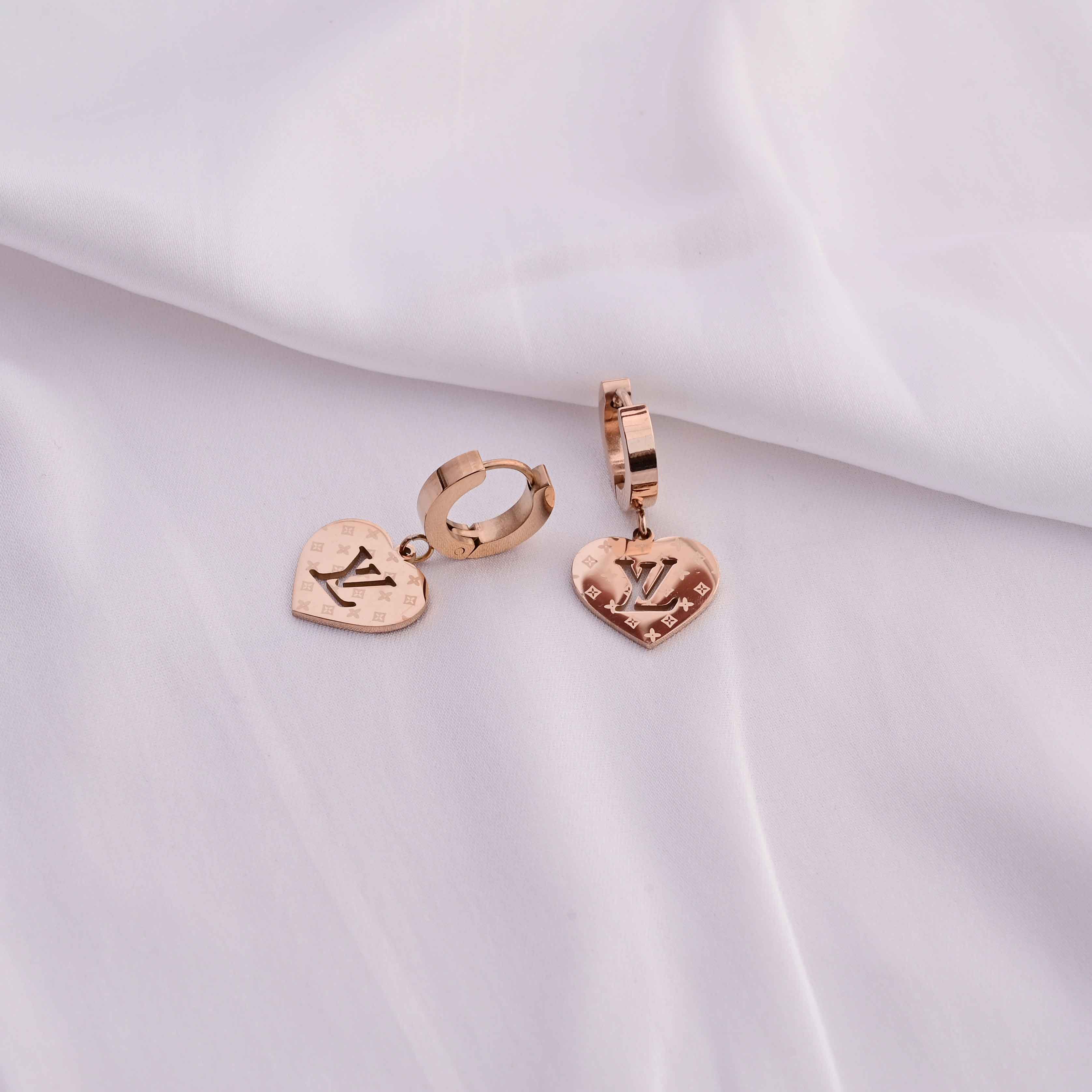 Louis Vuitton heart earrings in Rose gold
