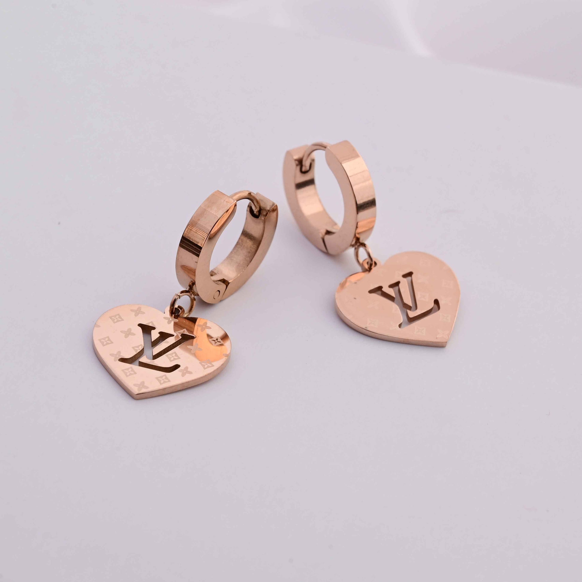 Louis Vuitton heart earrings in Rose gold
