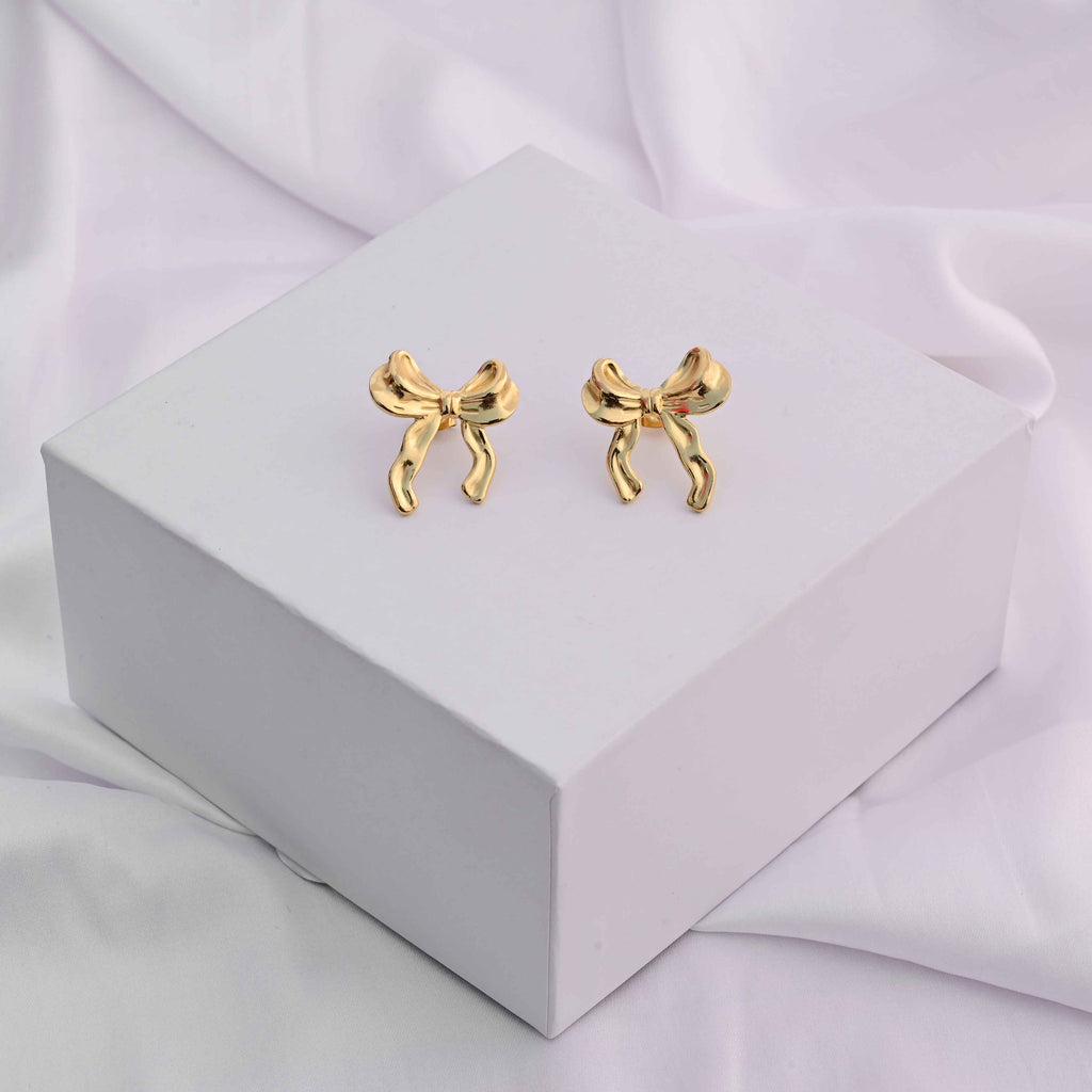 Bows earrings in gold