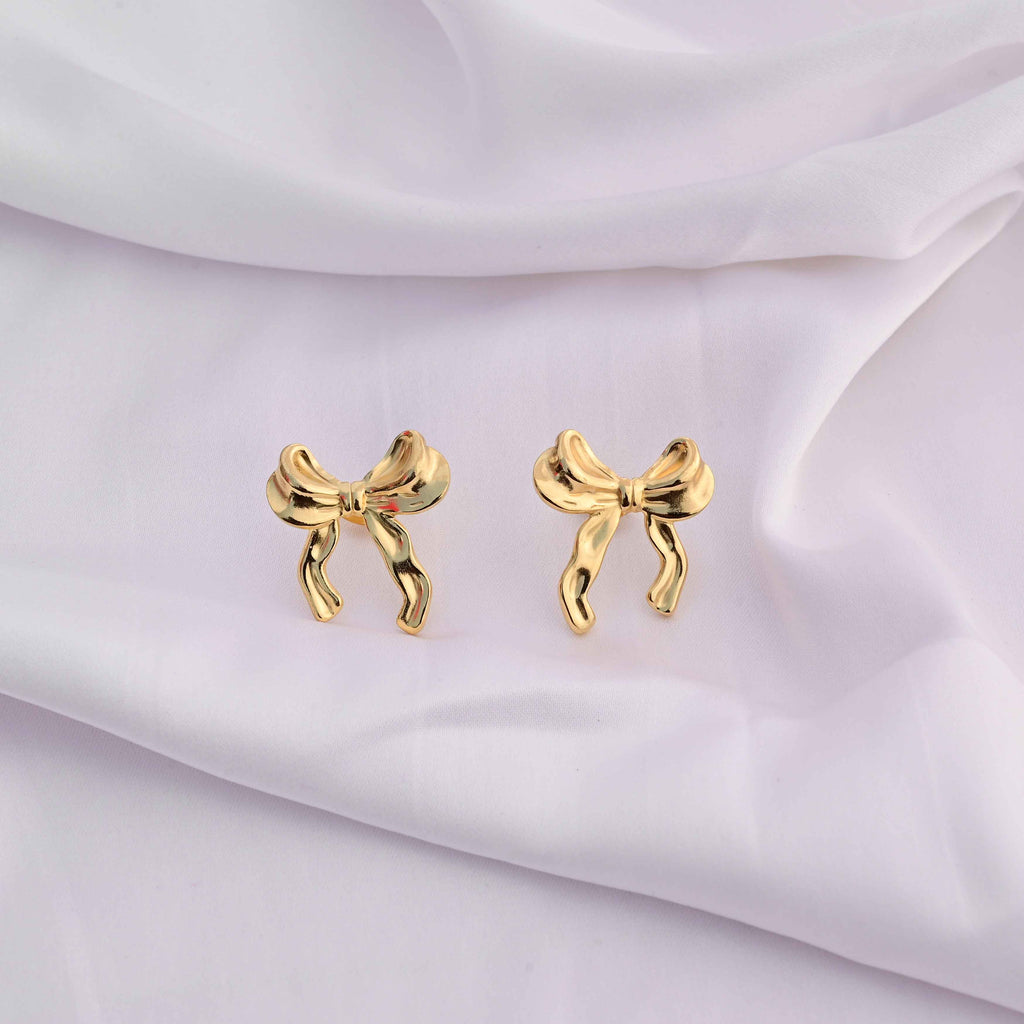Bows earrings in gold