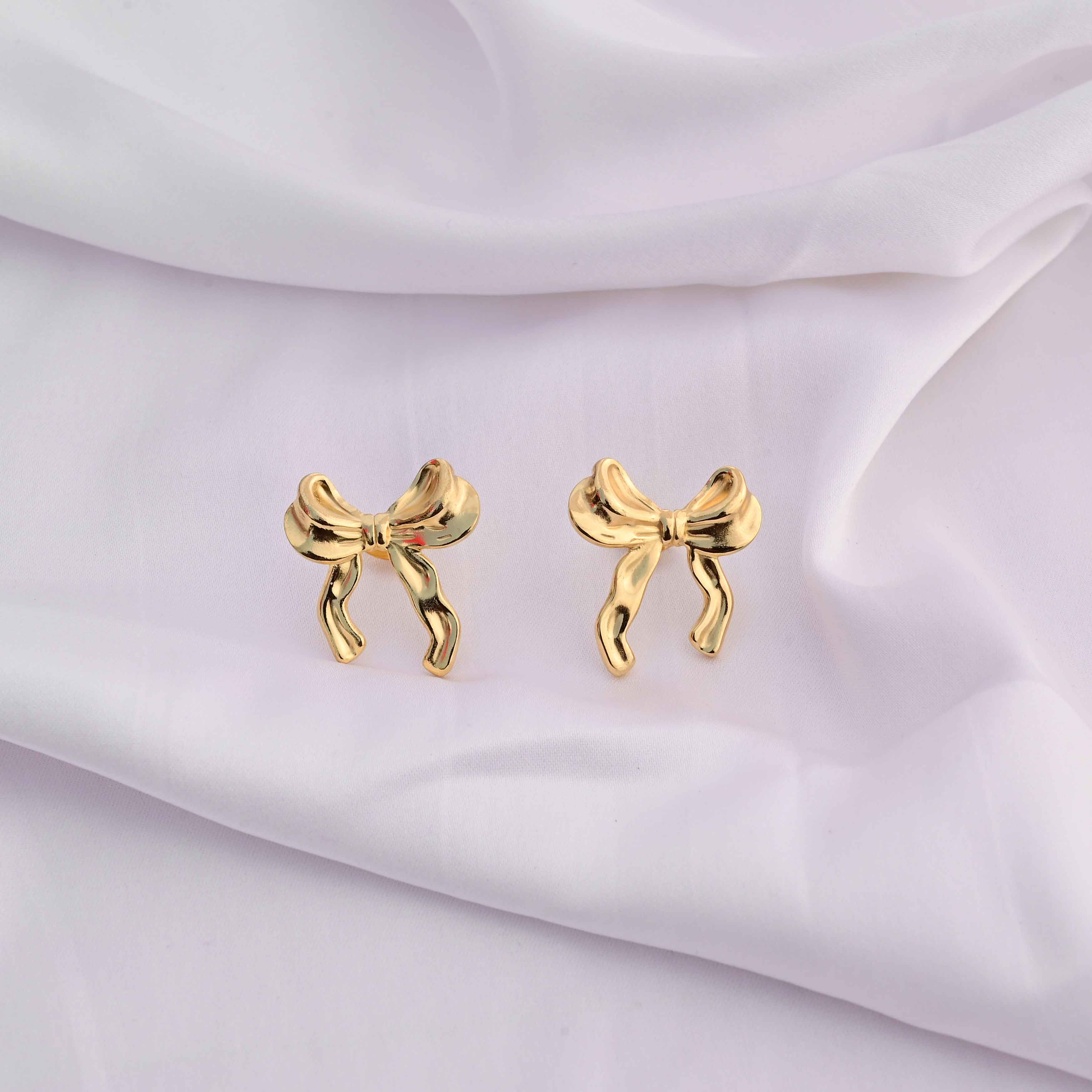Bows earrings in gold