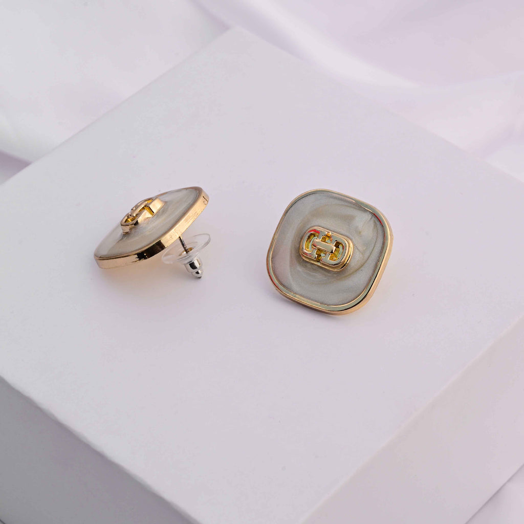Square gold earrings with ivory enamel