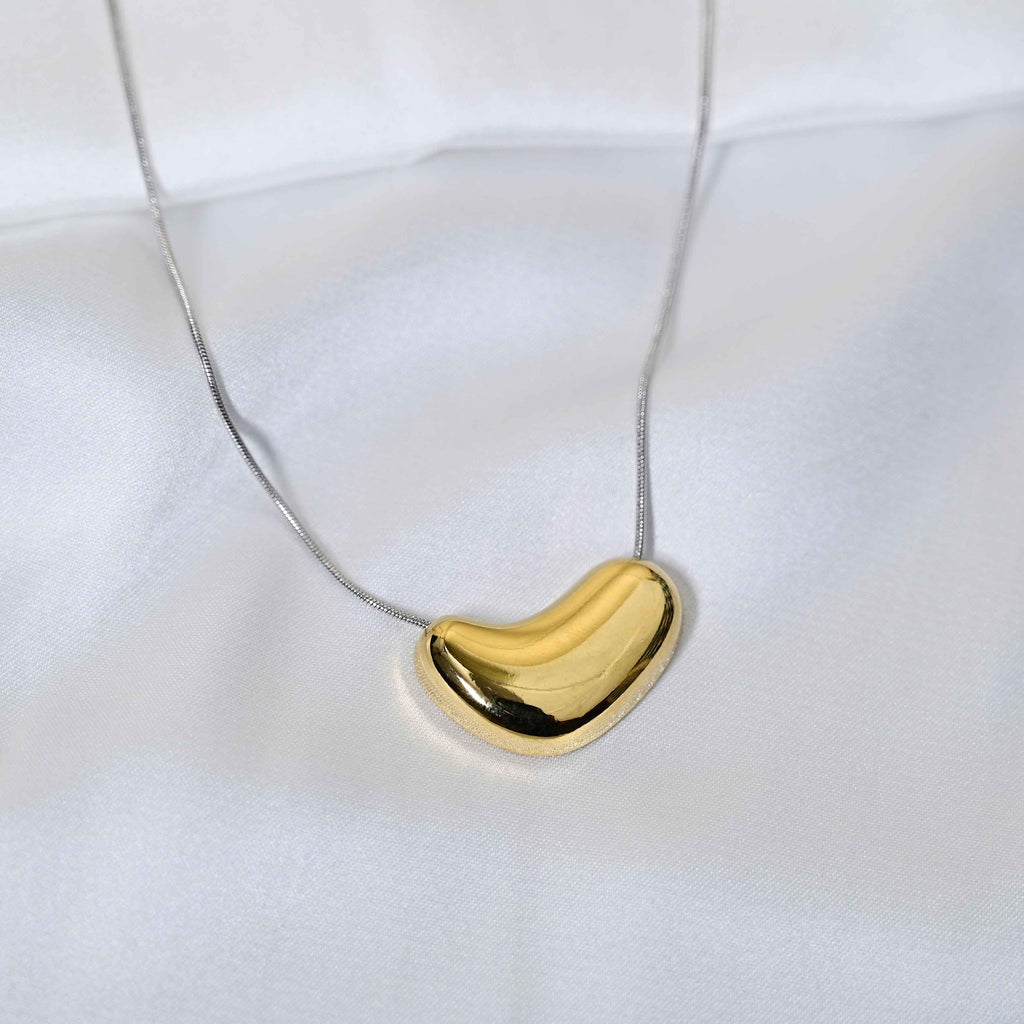 Molten Heart Necklace: Golden Heart with silver Chain