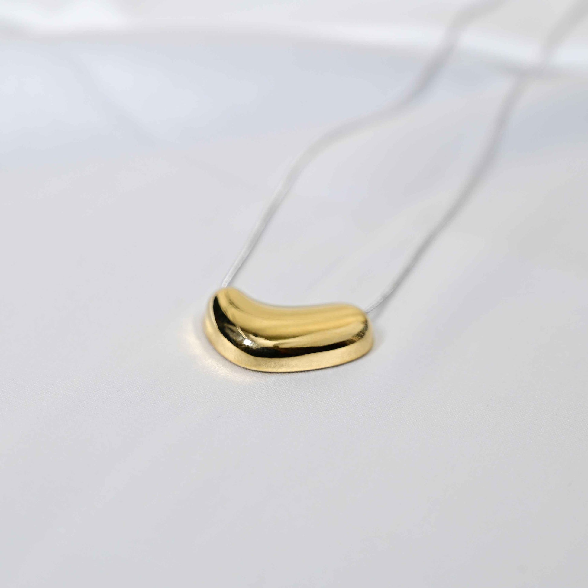 Molten Heart Necklace: Golden Heart with silver Chain