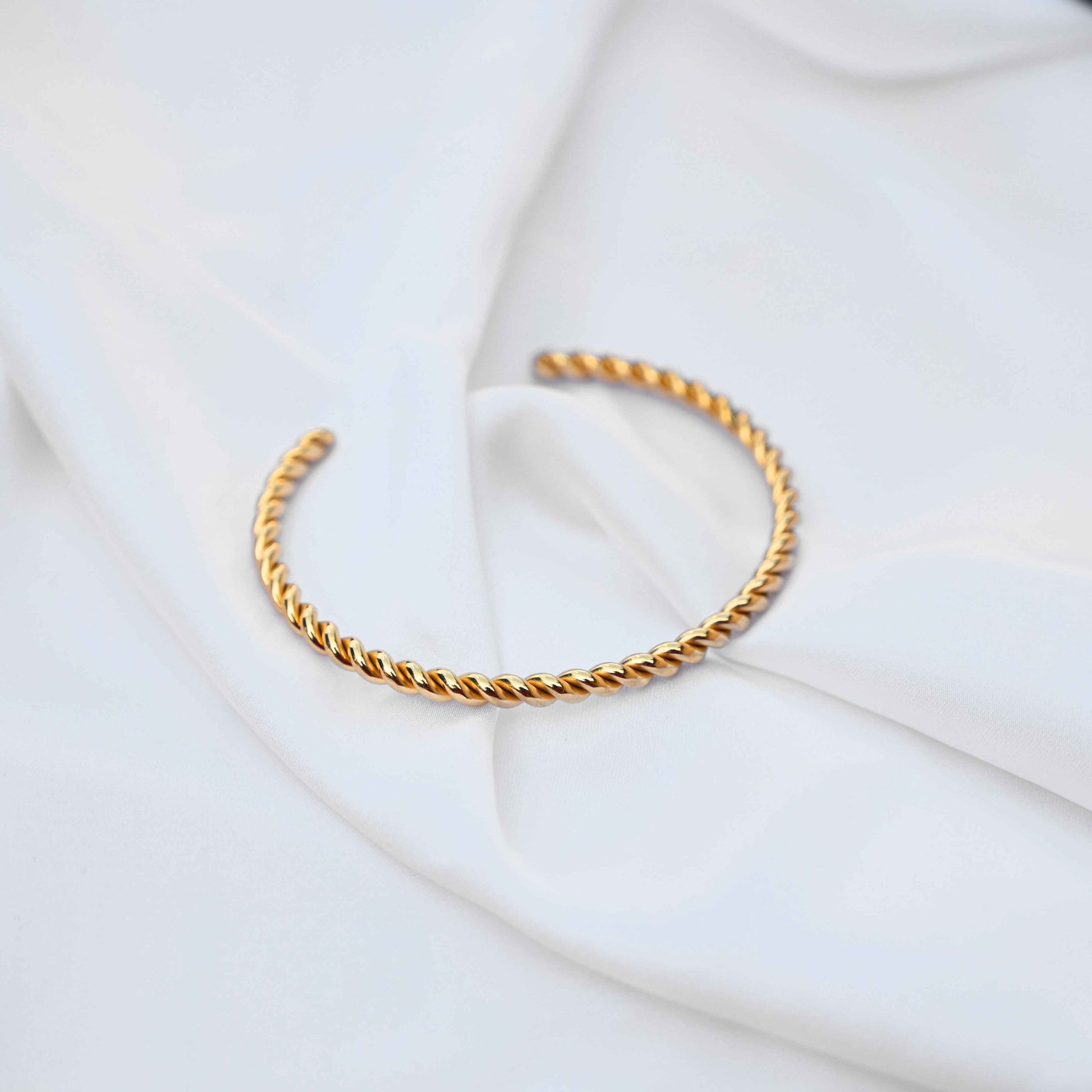 Twisted minimalistic gold bangle: anti Tarnish jewellery
