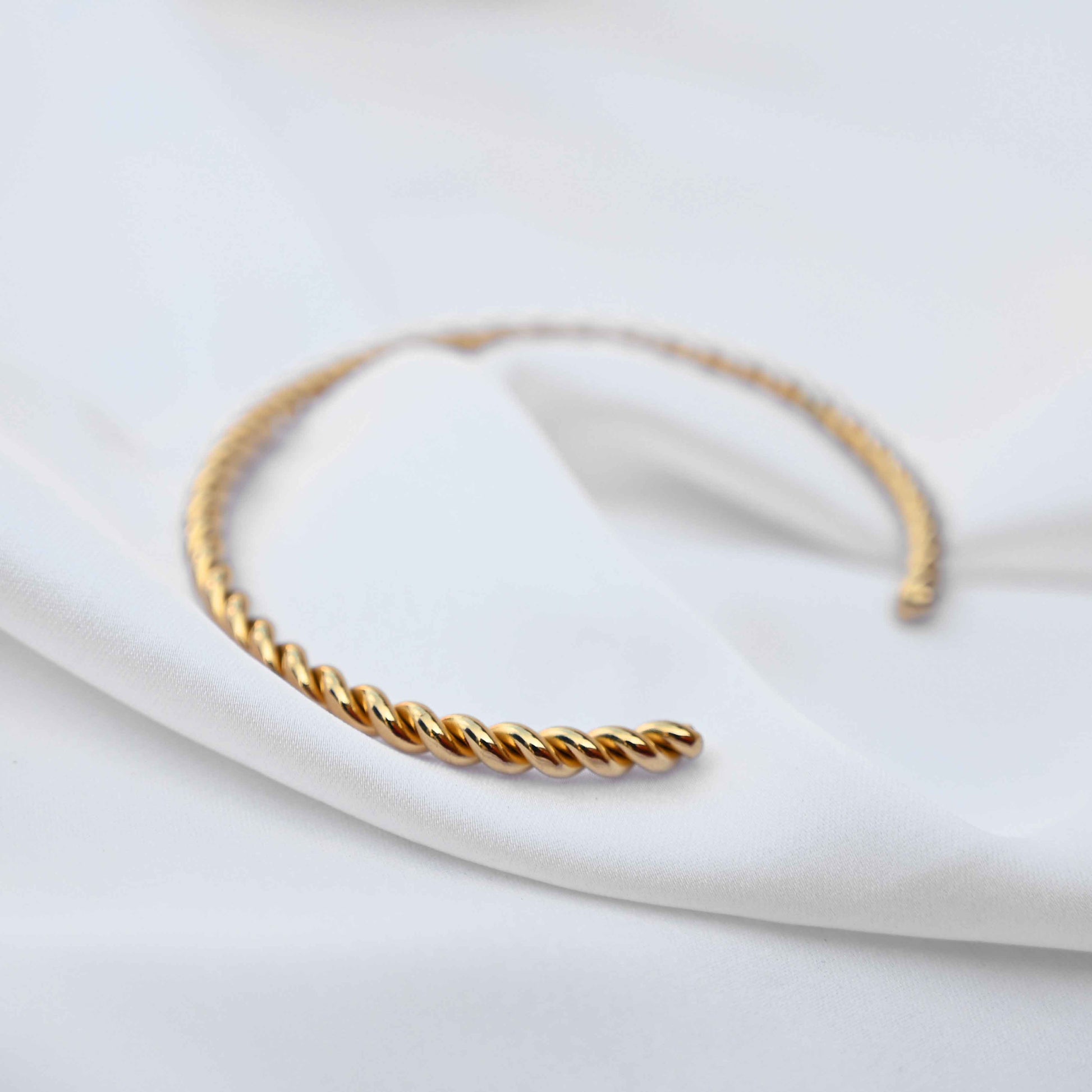 Twisted minimalistic gold bangle: anti Tarnish jewellery