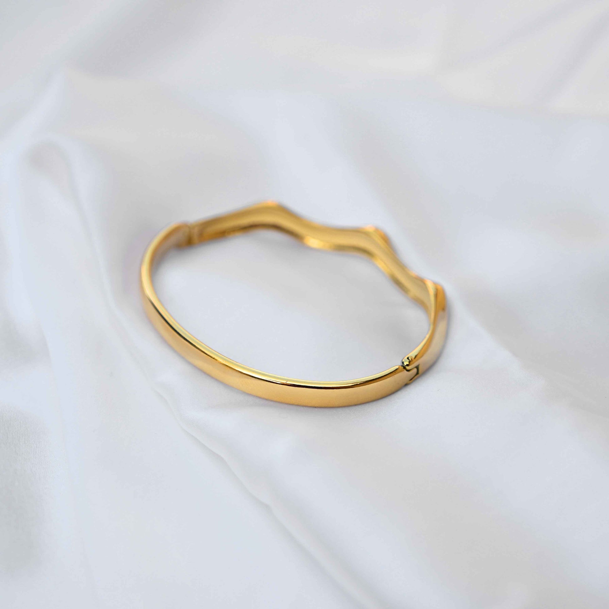 Wavy gold pattern bangle: Anti Tarnish jewellery