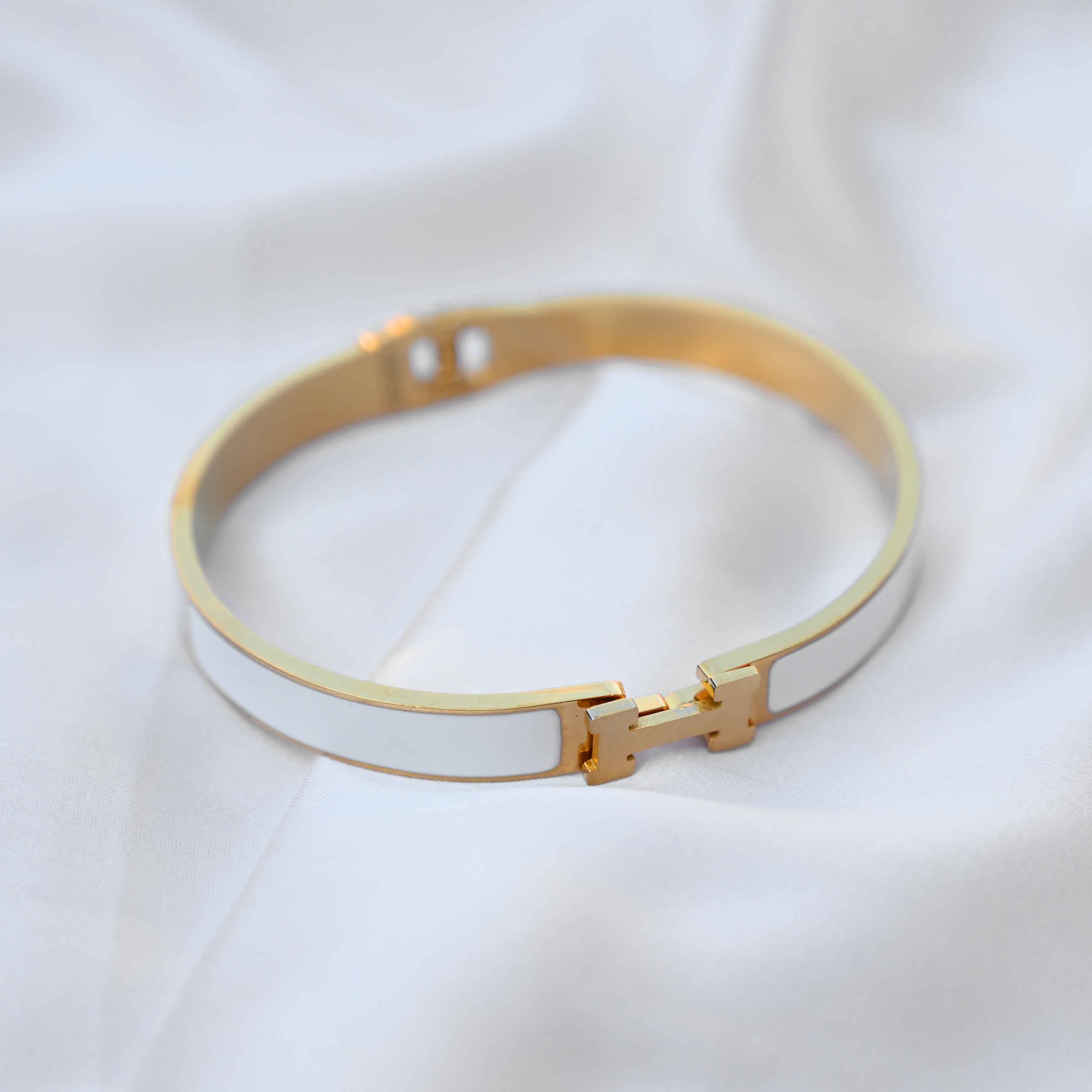 gold Hermes logo signature bracelet