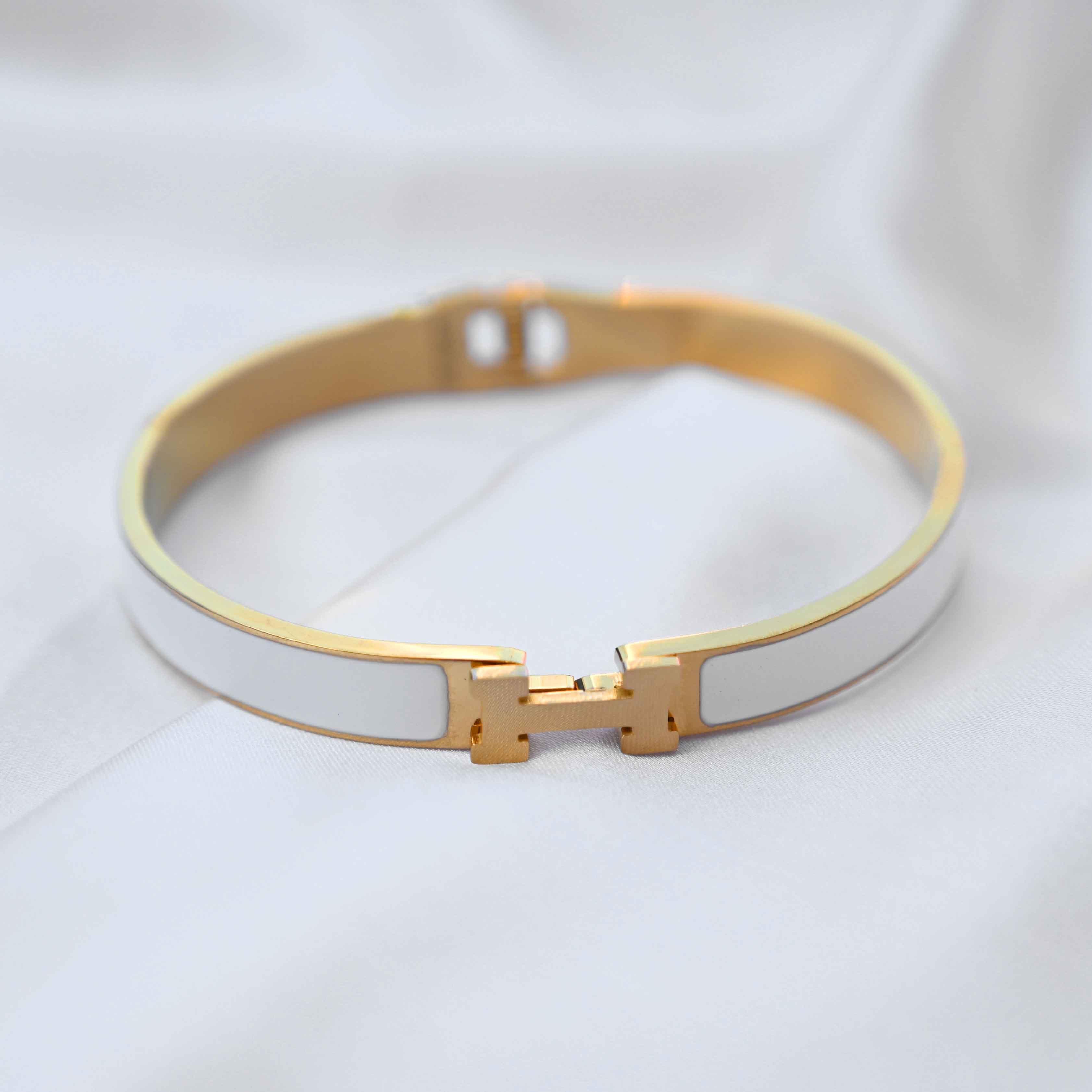 gold Hermes logo signature bracelet