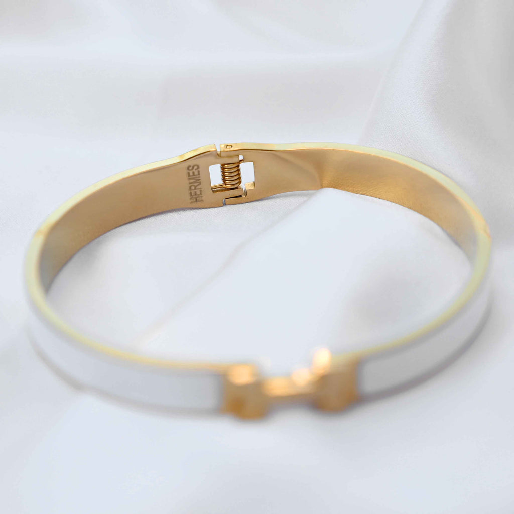 gold Hermes logo signature bracelet