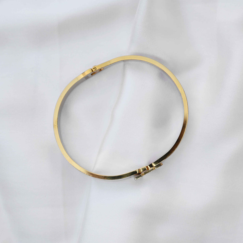 gold Hermes logo signature bracelet
