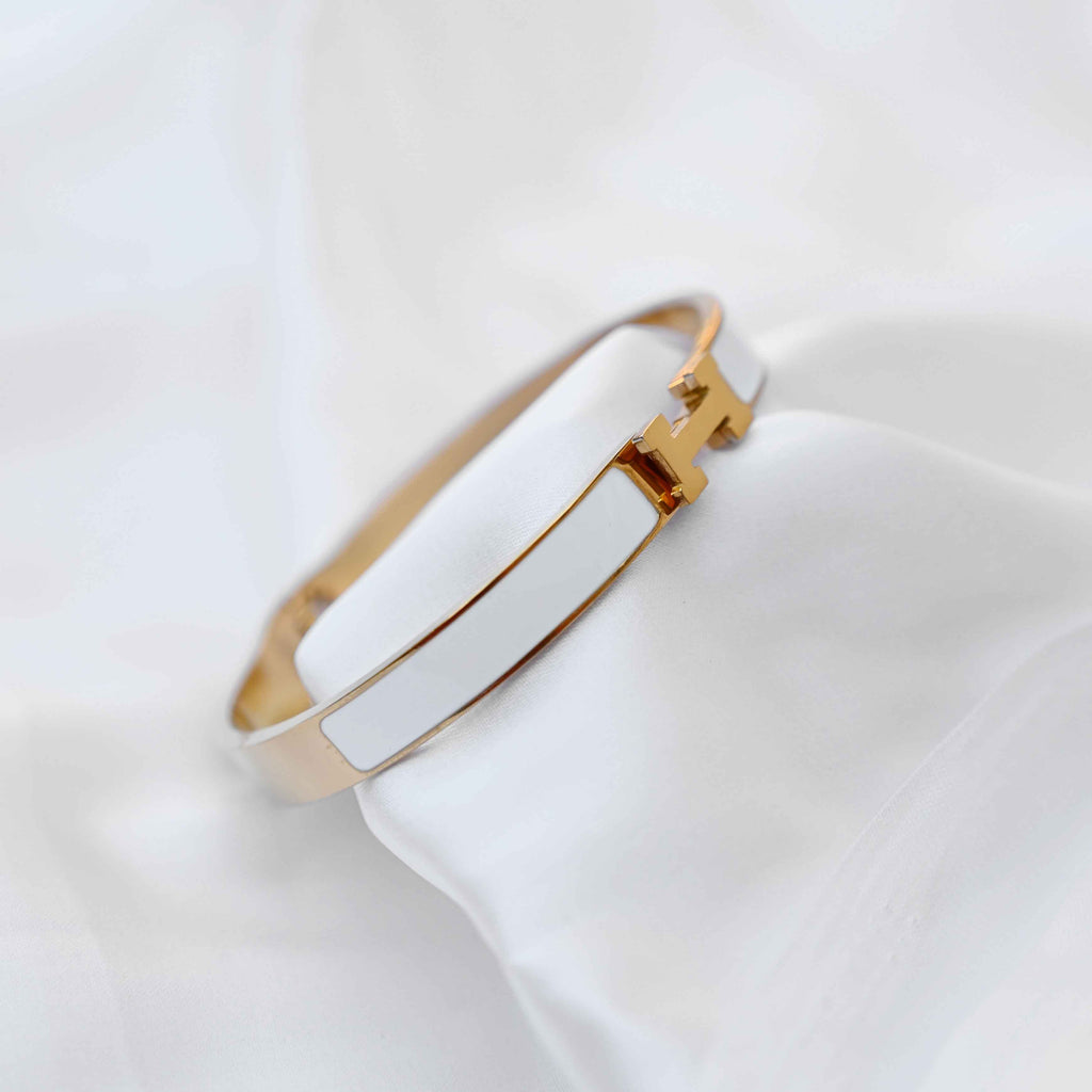 gold Hermes logo signature bracelet