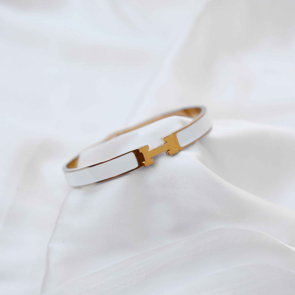 gold Hermes logo signature bracelet