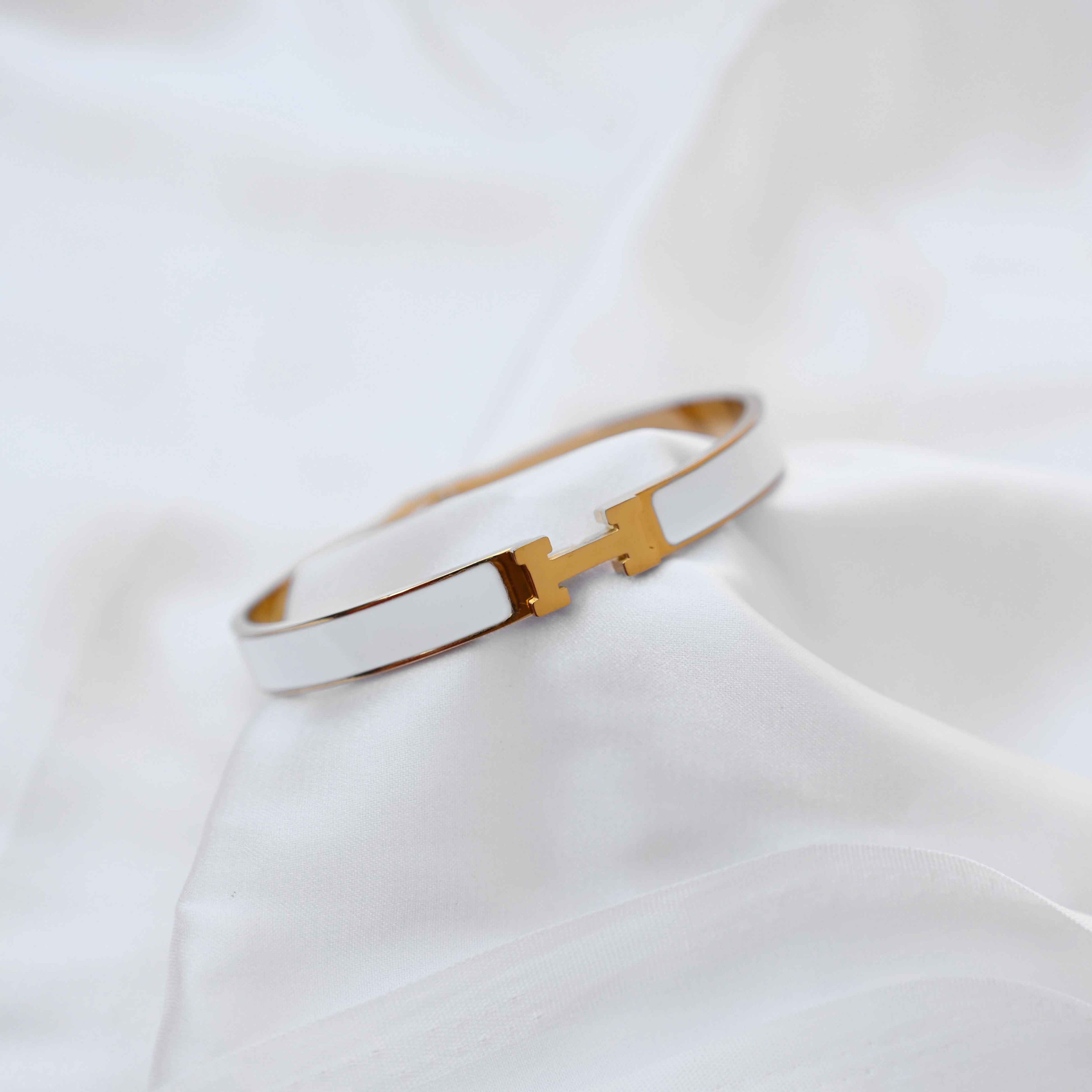 gold Hermes logo signature bracelet