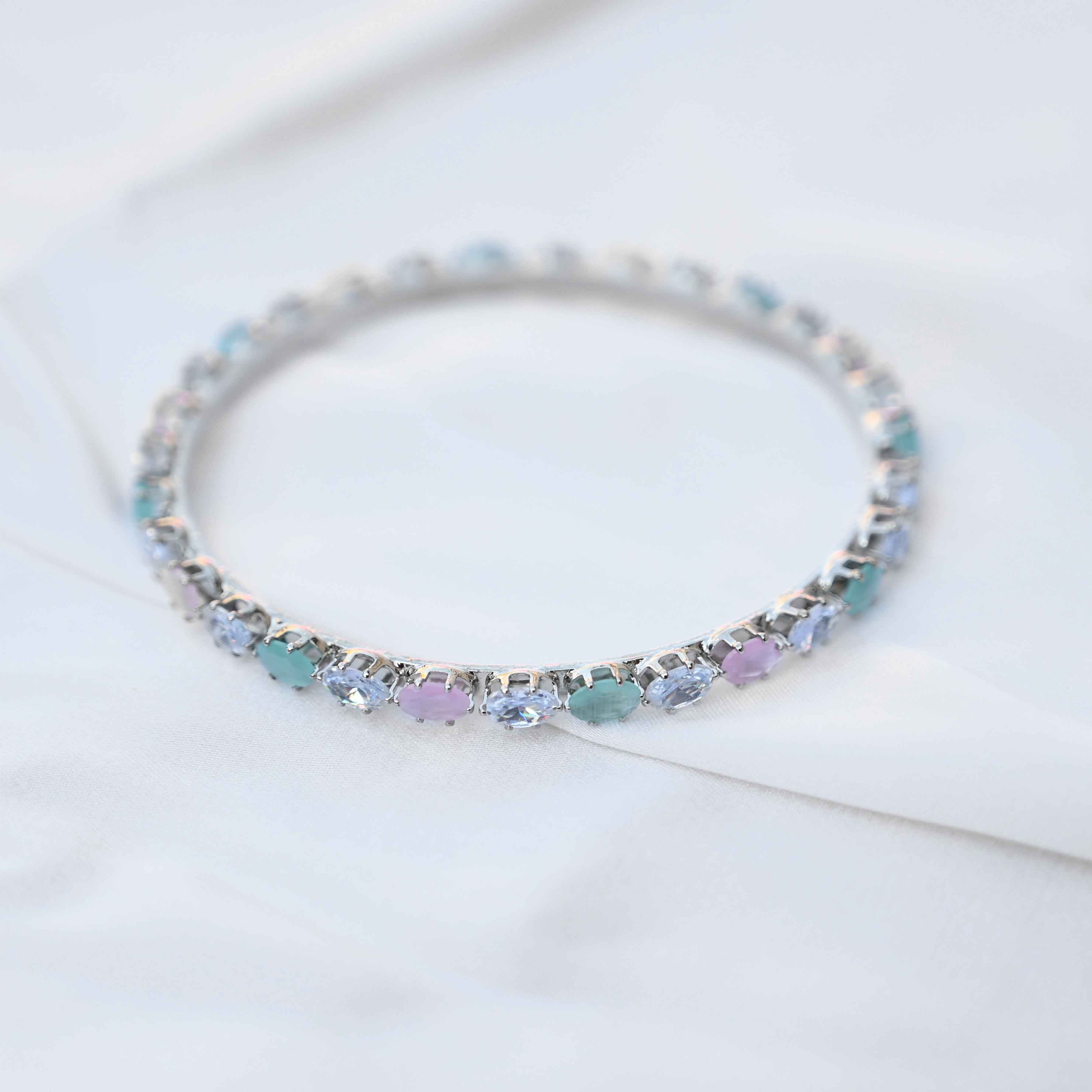Pastel crystal bangles set in pastel green and pink