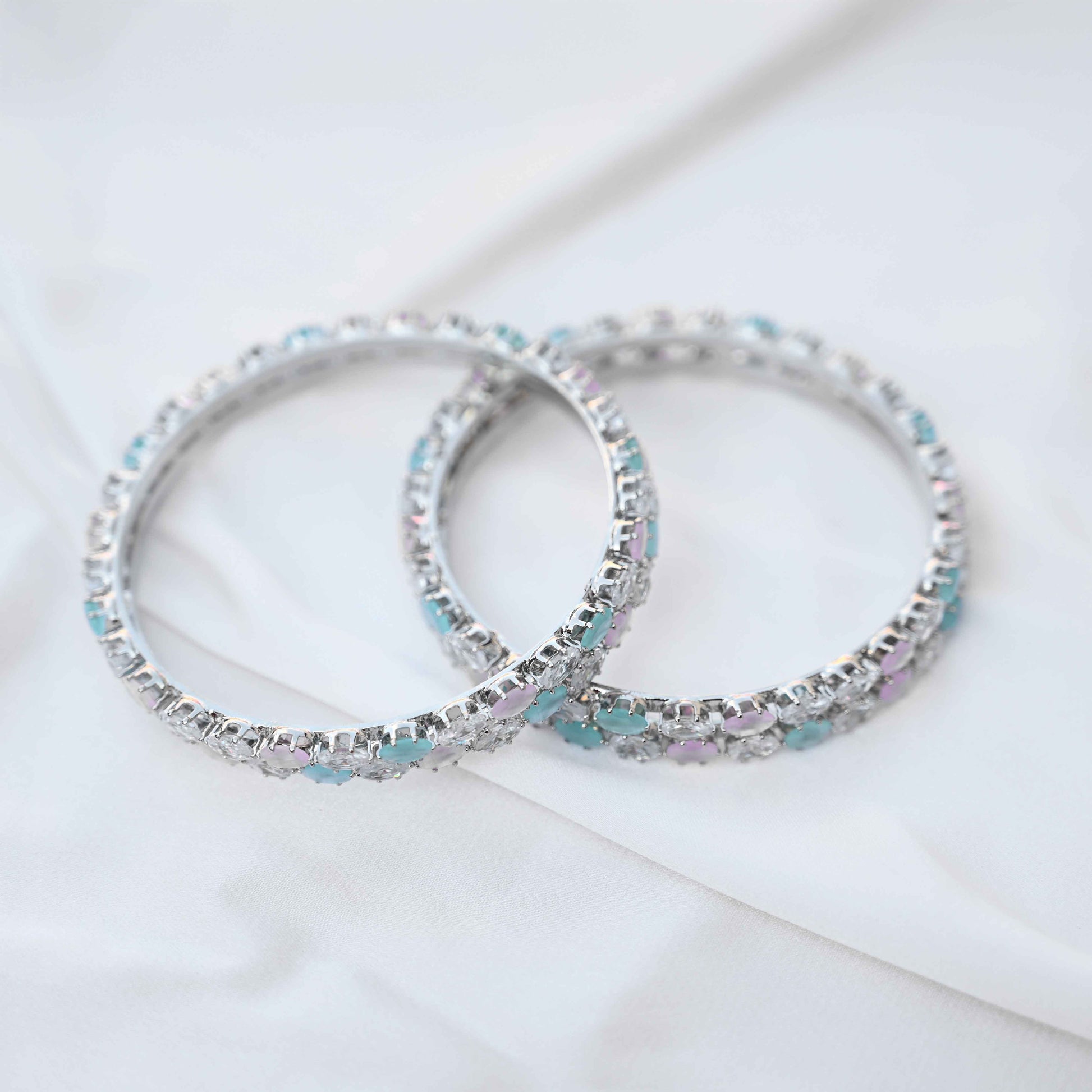 Pastel crystal bangles set in pastel green and pink