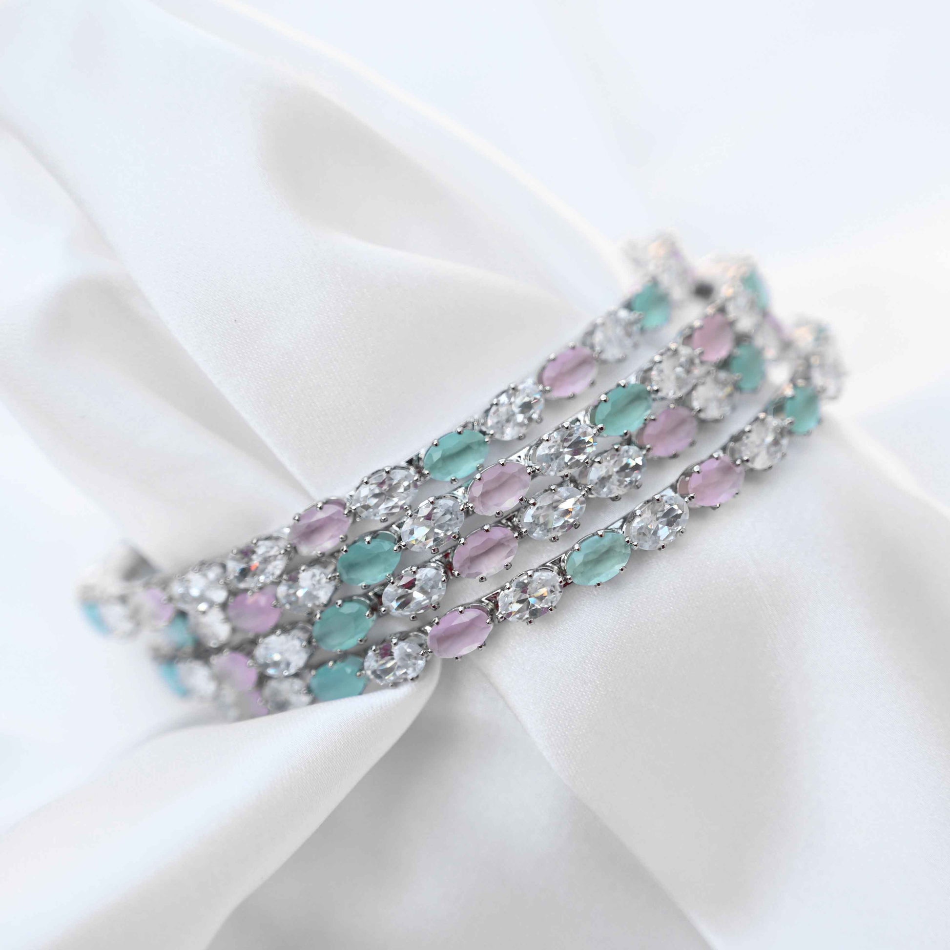 Pastel crystal bangles set in pastel green and pink
