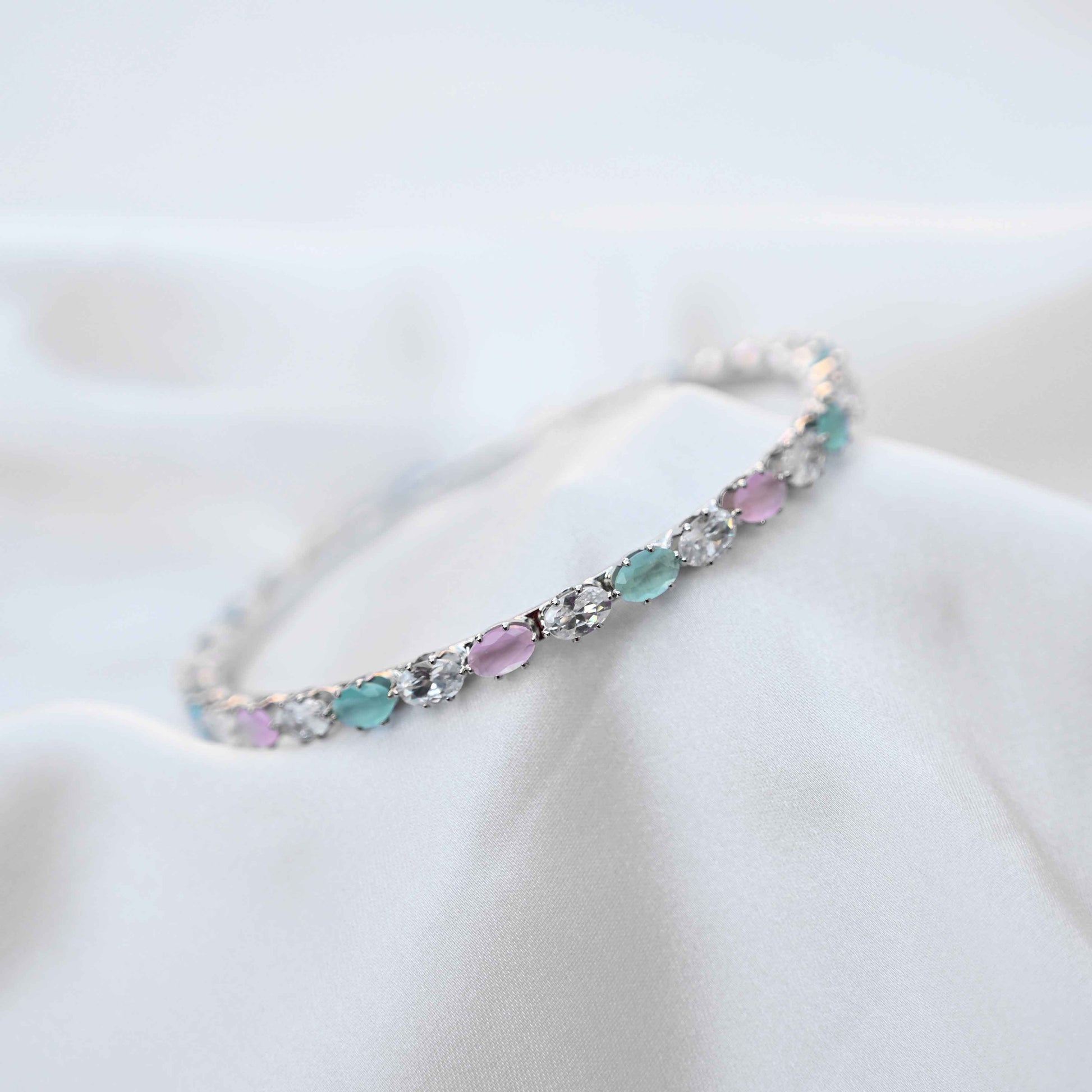 Pastel crystal bangles set in pastel green and pink