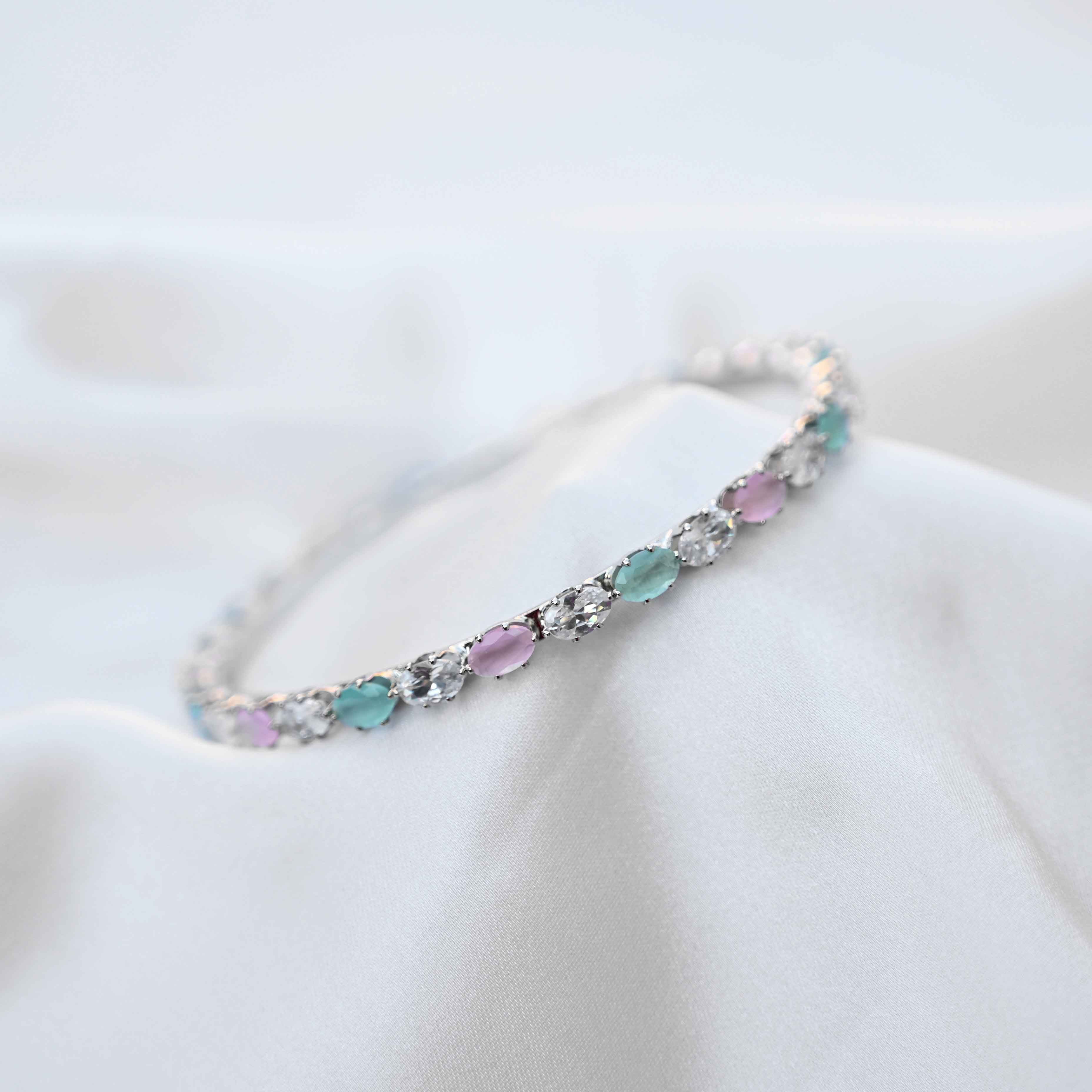 Pastel crystal bangles set in pastel green and pink