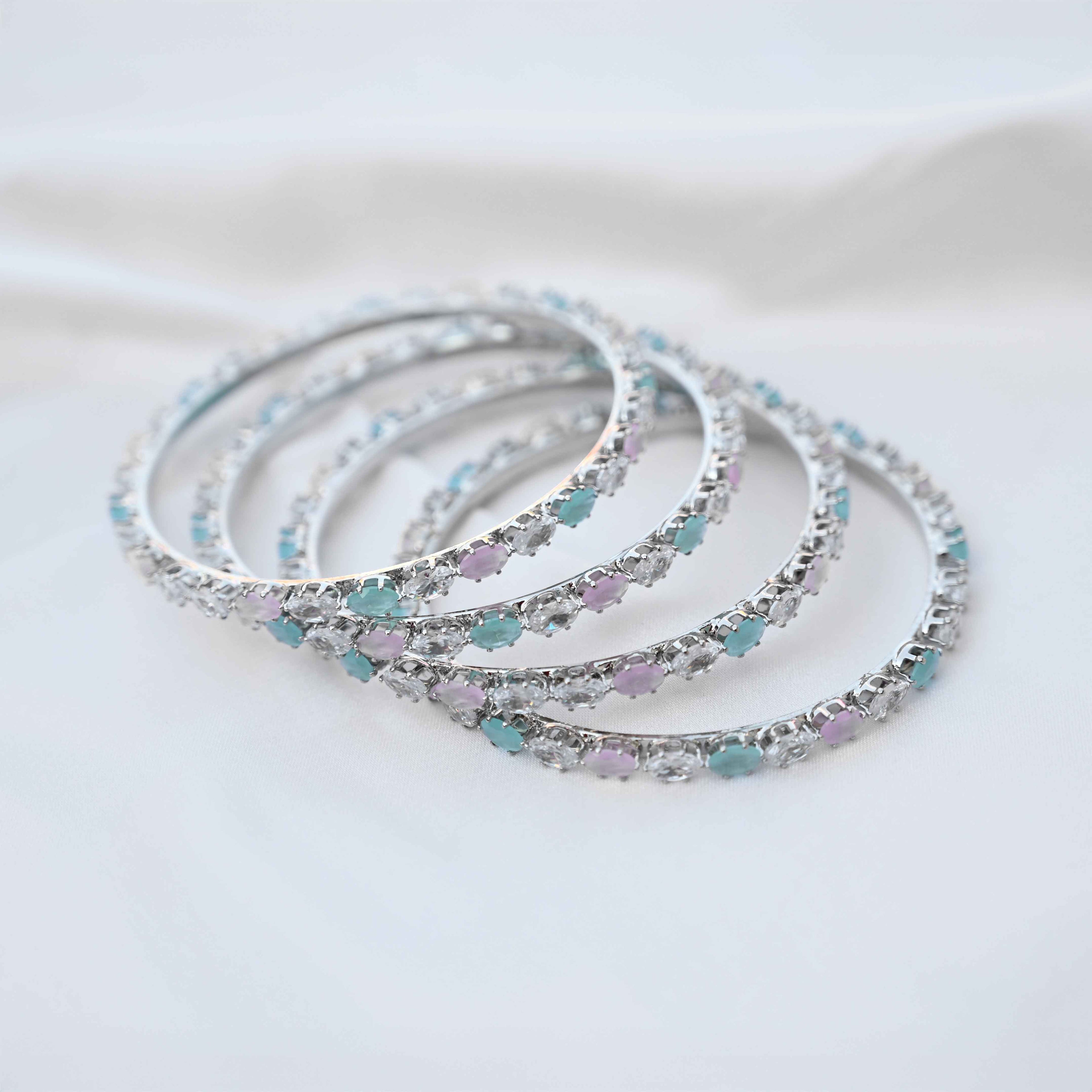 Pastel crystal bangles set in pastel green and pink