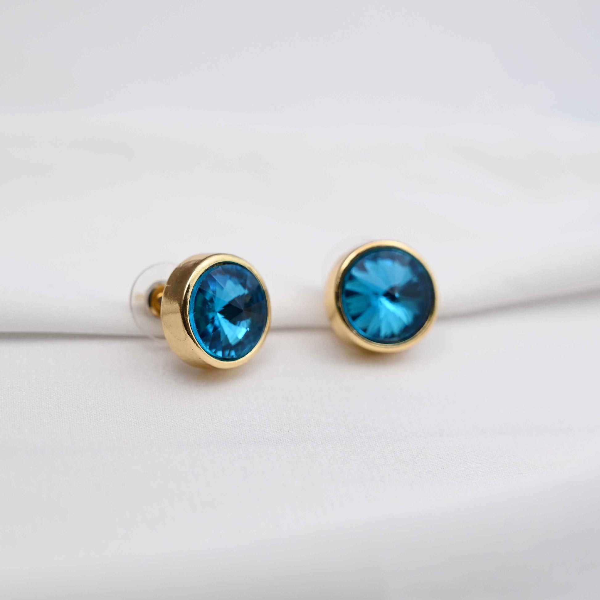 Round bezel earrings in lavender & Aqua blue color