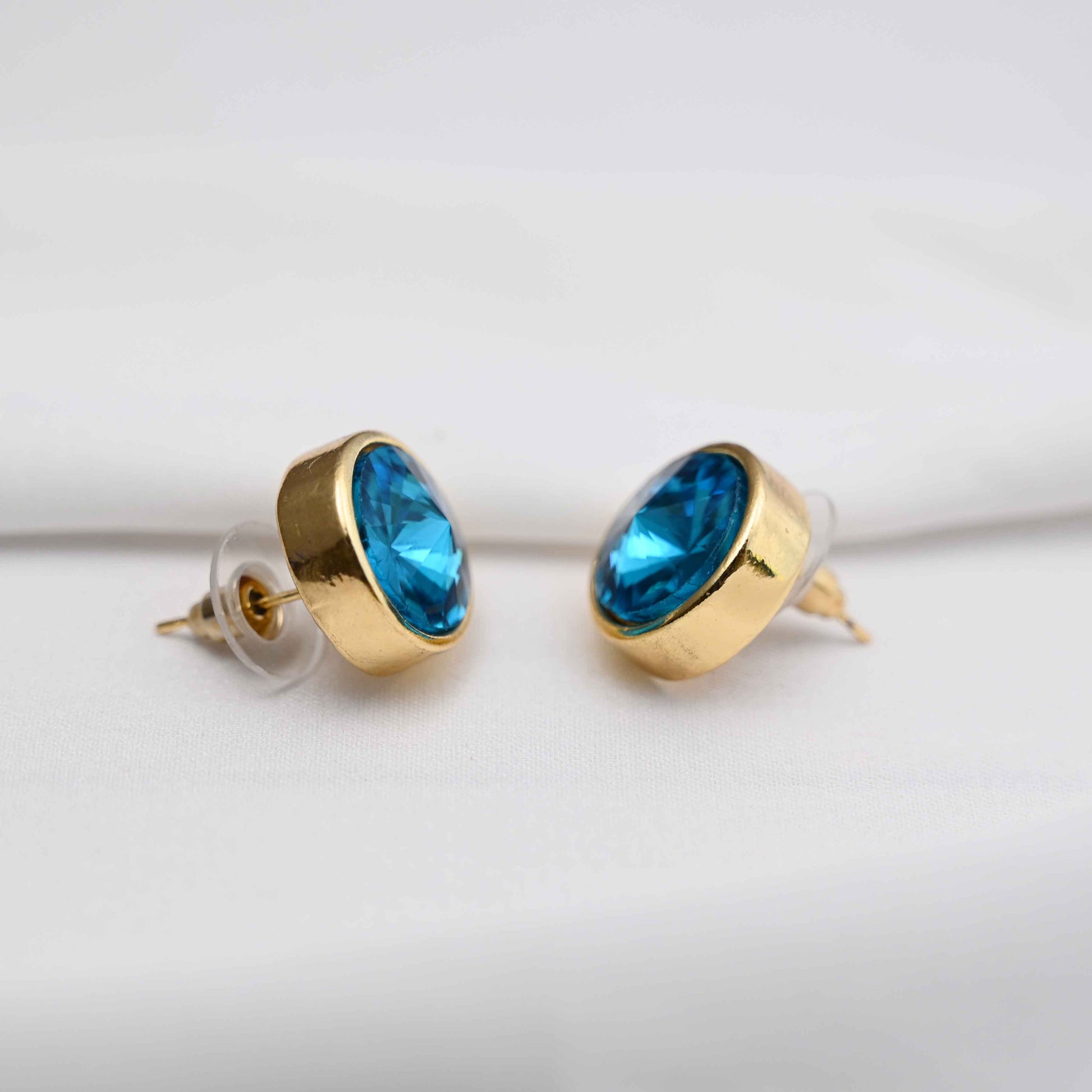 Round bezel earrings in lavender & Aqua blue color