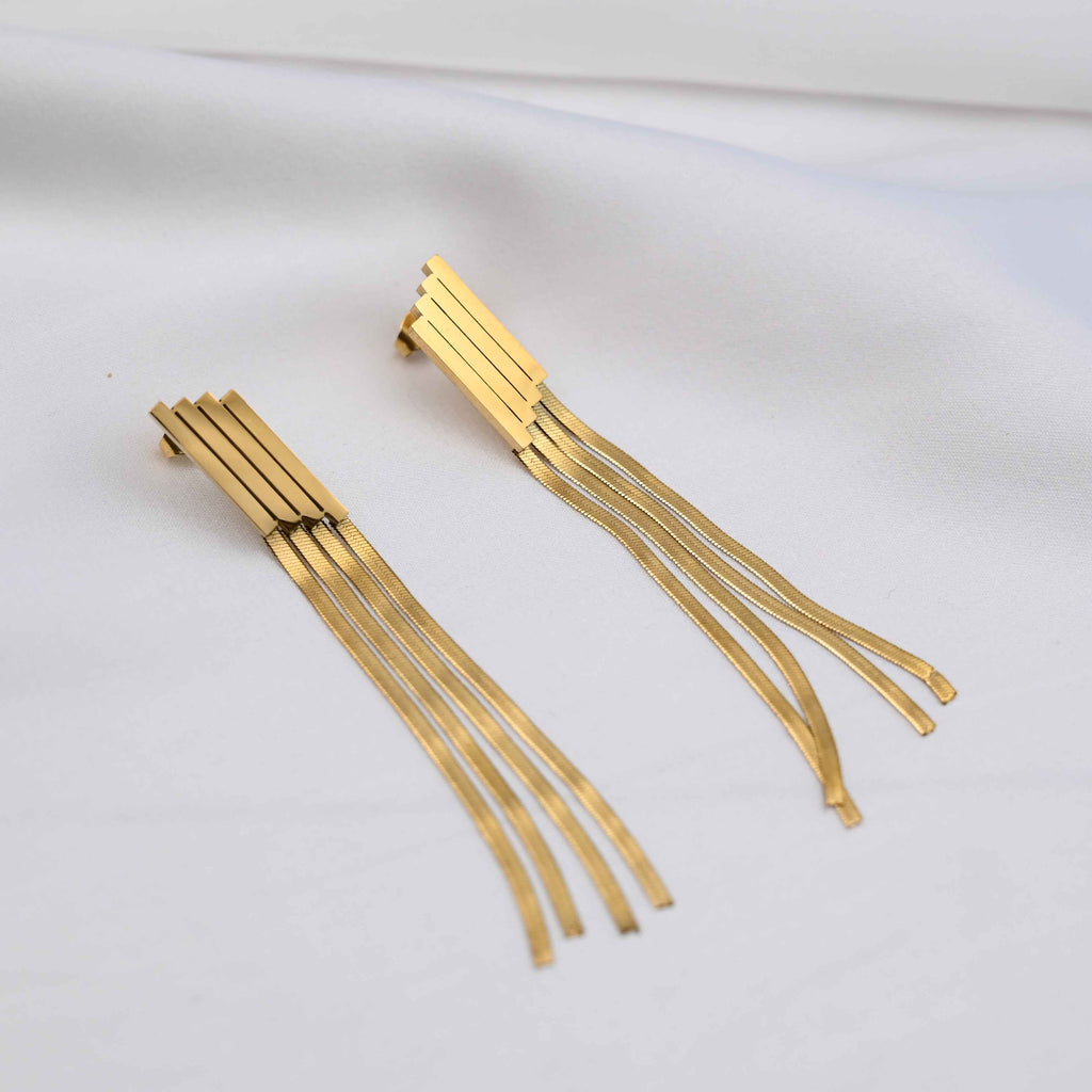 Long Drop serpent chain earrings in gold