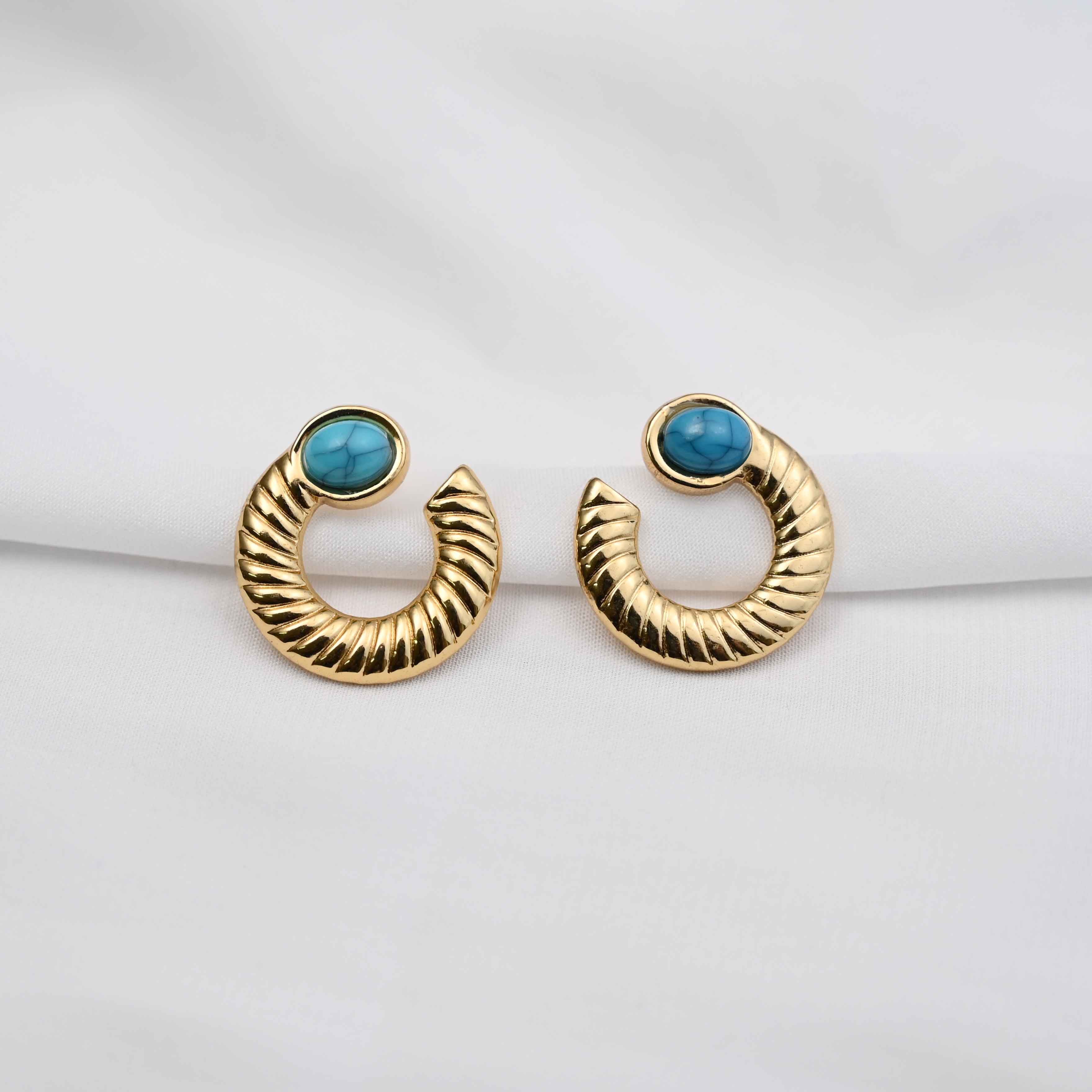 Turquoise loop stud earrings in gold with blue stone