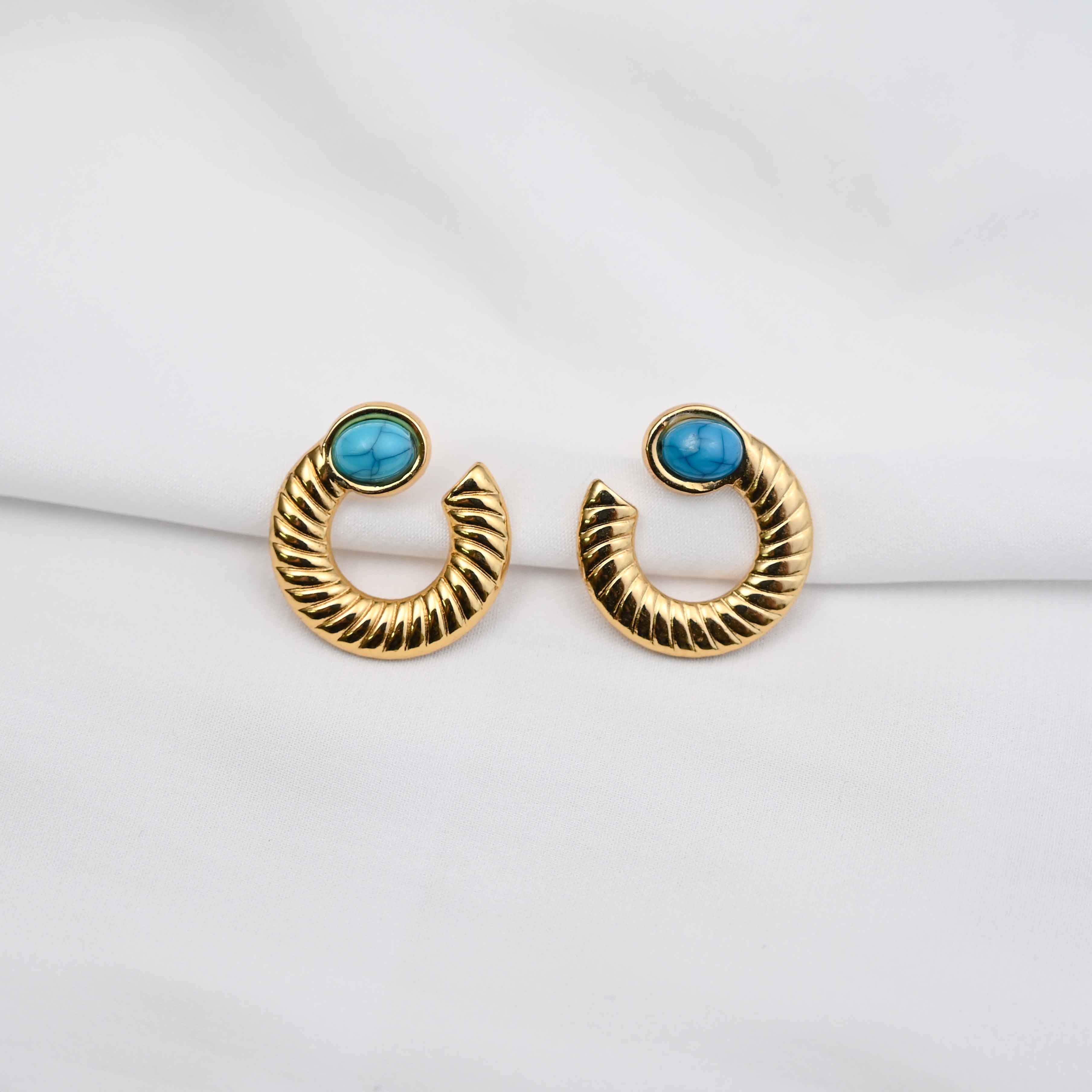 Turquoise loop stud earrings in gold with blue stone