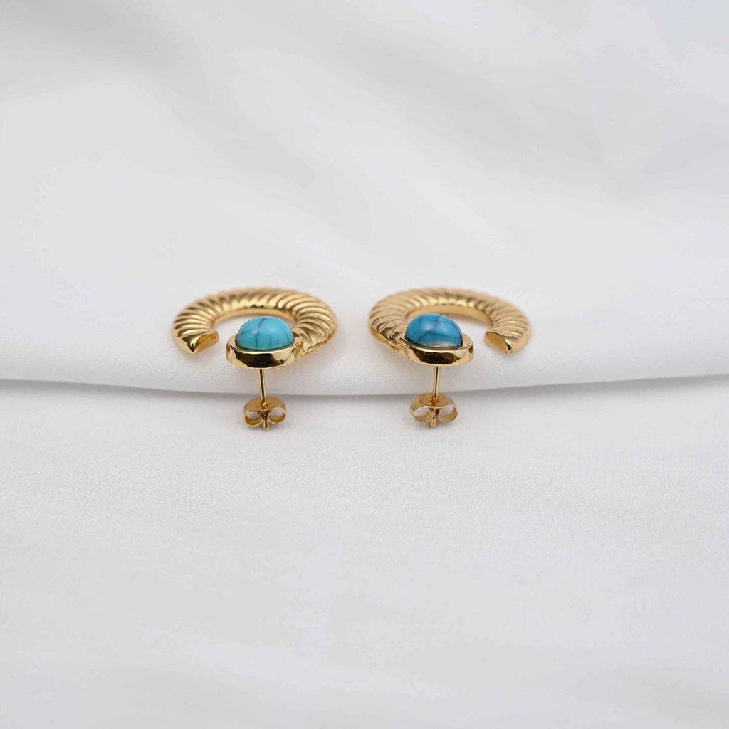 Turquoise loop stud earrings in gold with blue stone