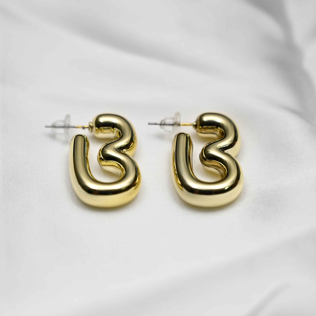 Gold inflated earring