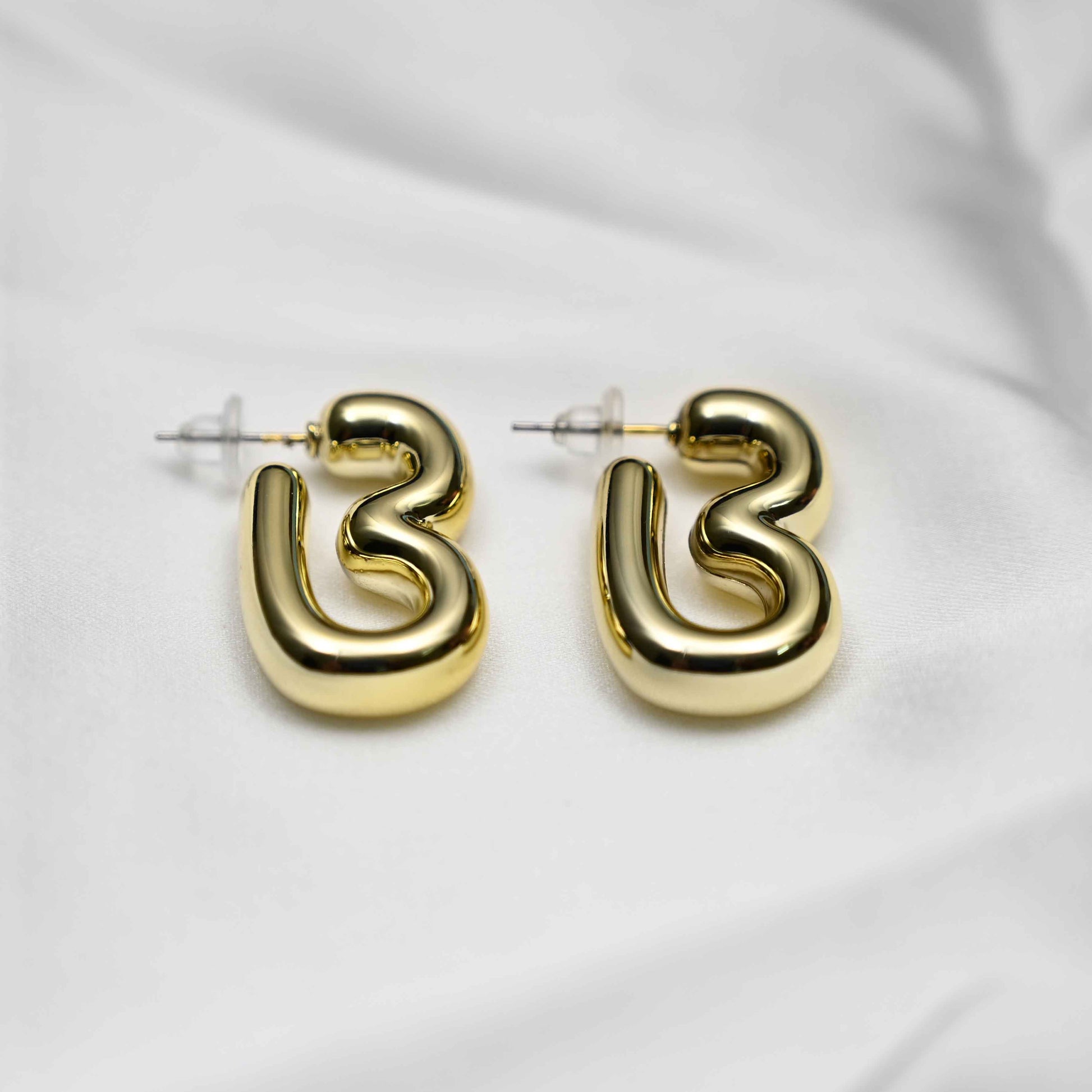 Gold inflated earring