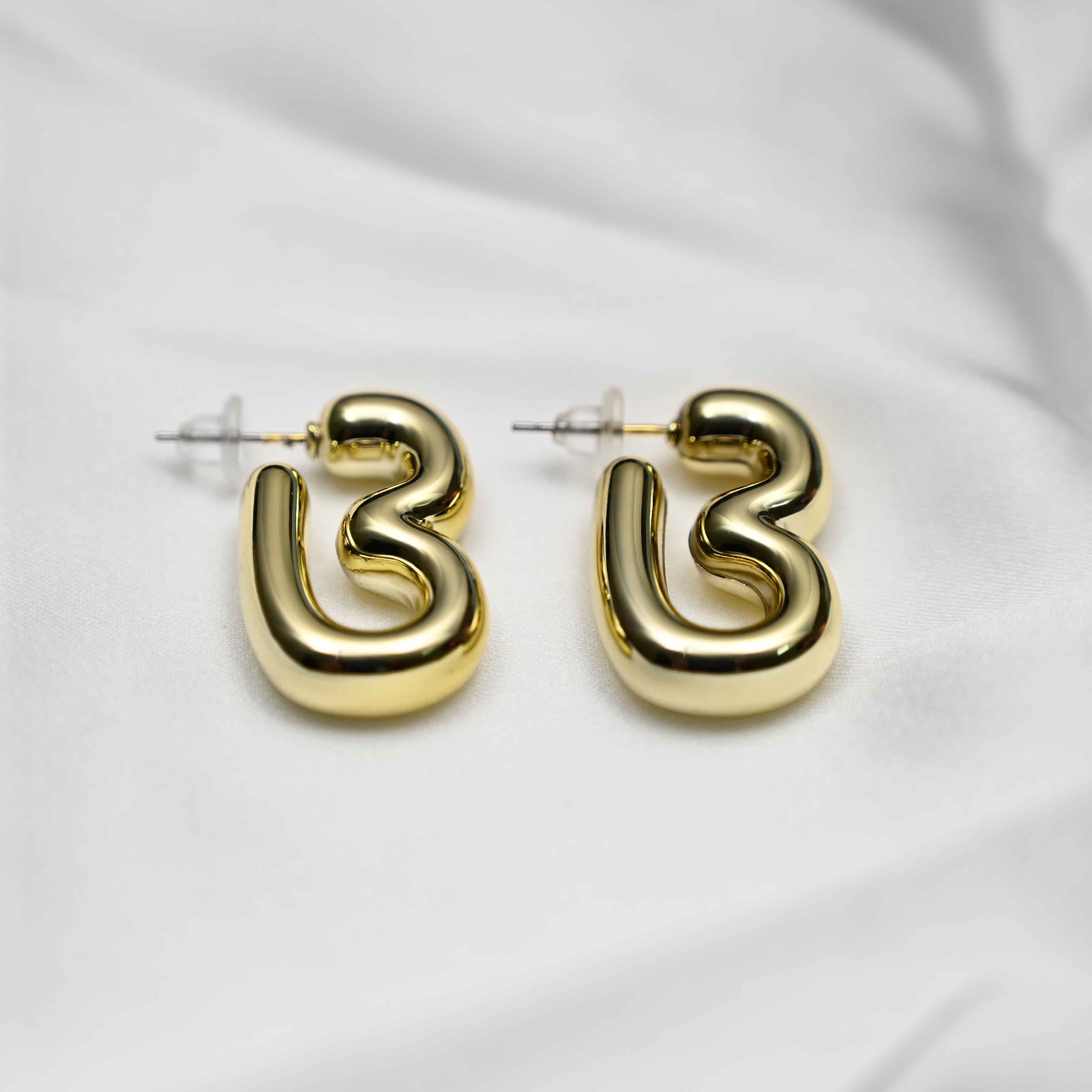 Gold inflated earring